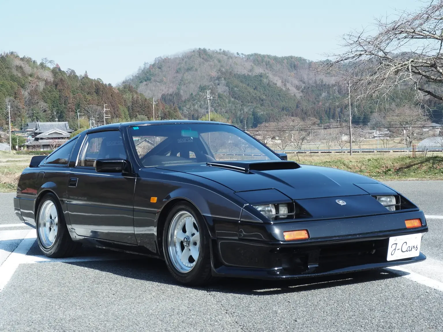 exterior view front drivers side angle view Nissan fairlady z 200zr 2 seater JDM for export from Japan