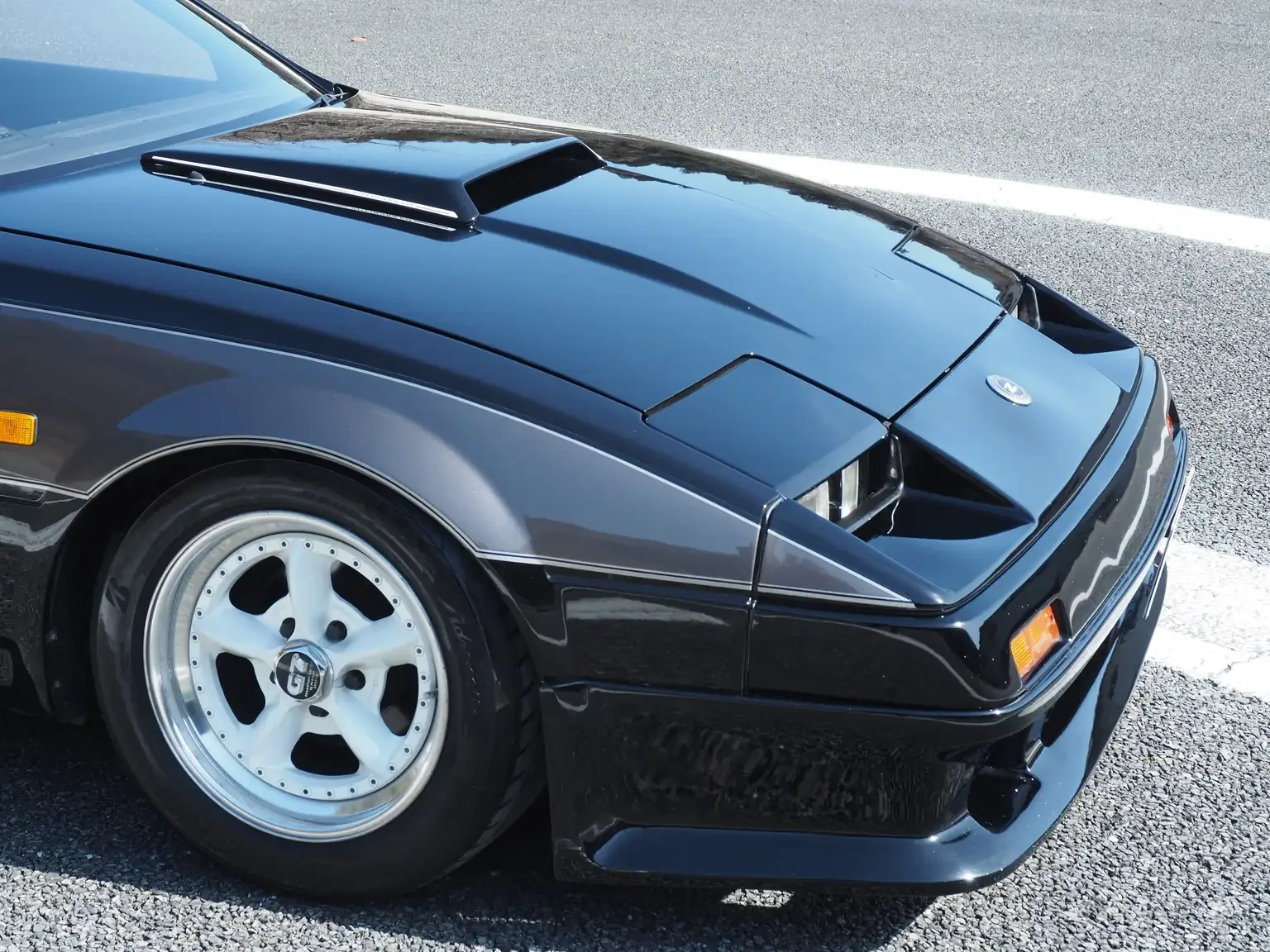 exterior view front drivers side fender black and grey two tone Nissan fairlady z 200zr 2 seater JDM for export from Japan