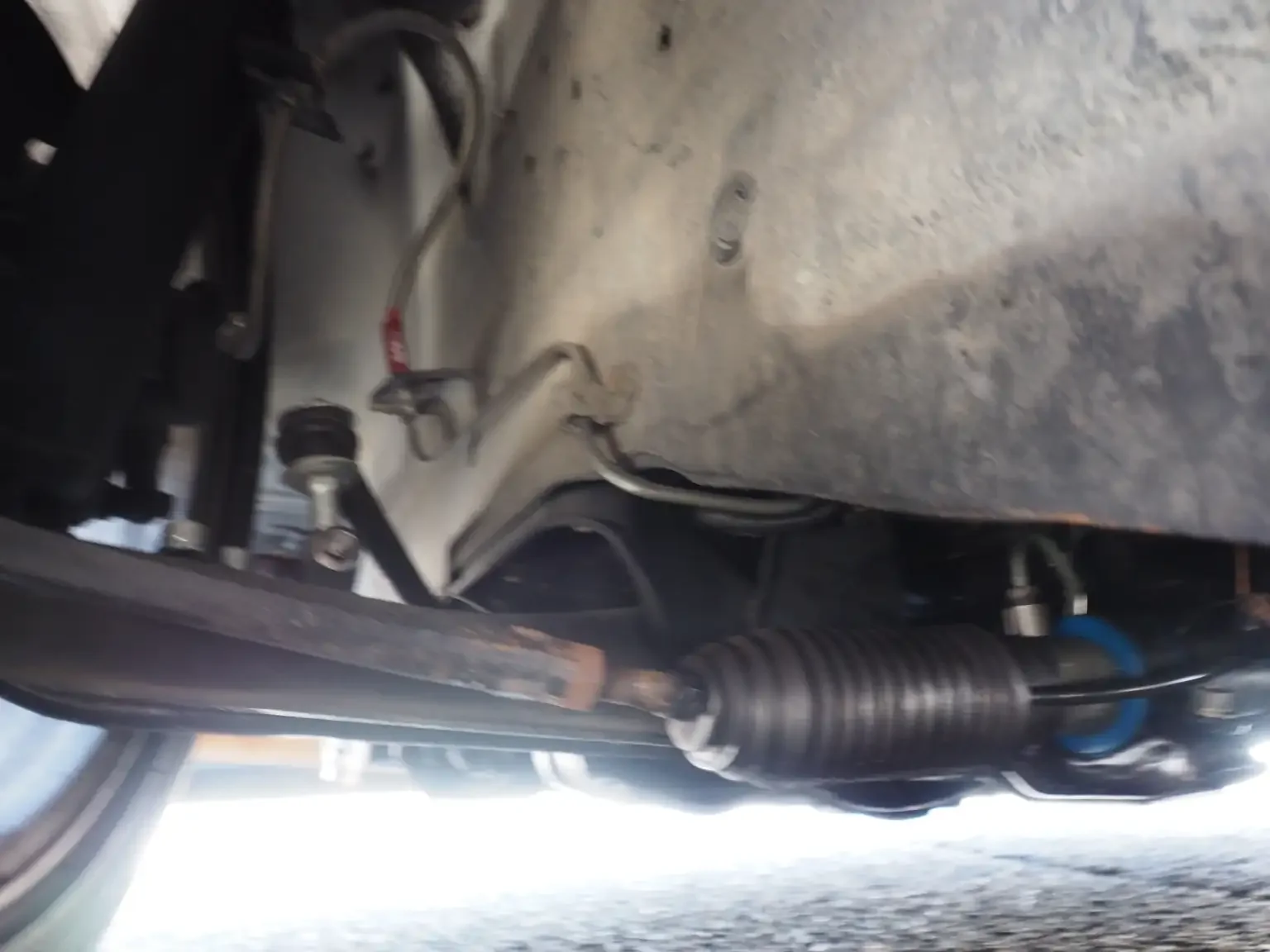 undercarriage view showing braided brake lines Nissan fairlady z 200zr 2 seater JDM for export from Japan