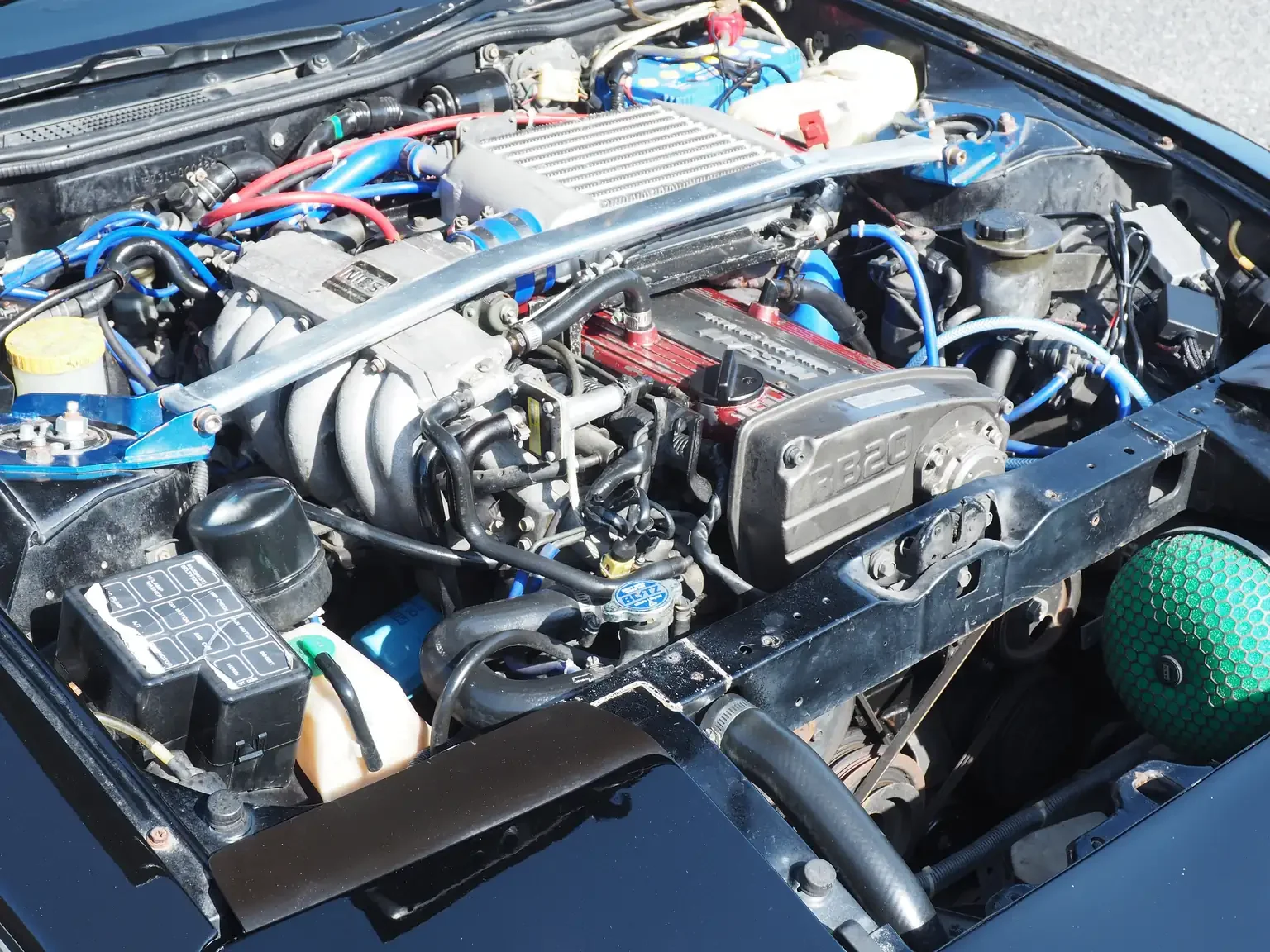 Front view with bonnet open showing modified rb20det engine in Nissan fairlady z JDM for export from Japan
