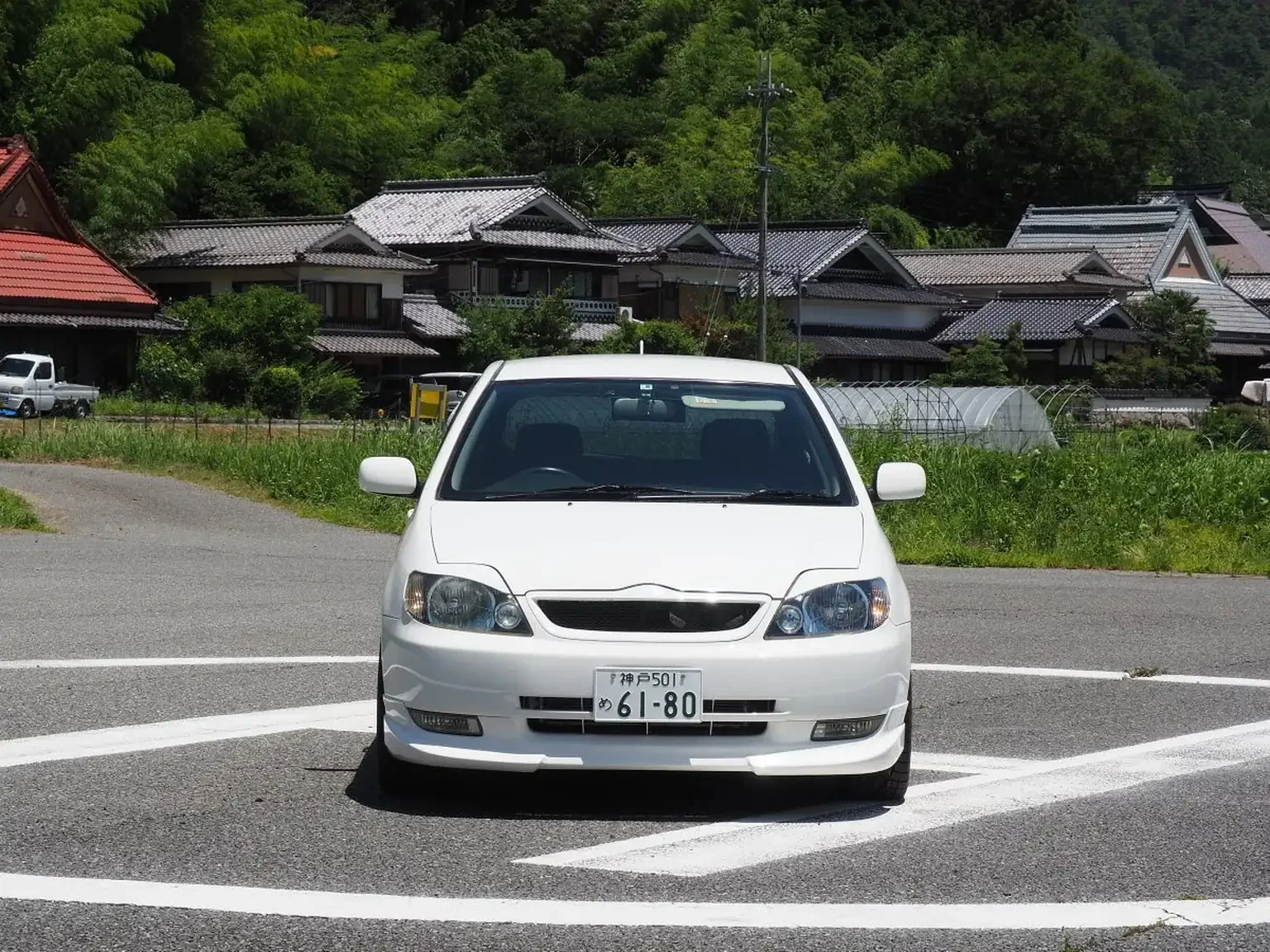 front end view white toyota corolla runx aero tourer z 6 speed zze123 JDM export stock for sale japan