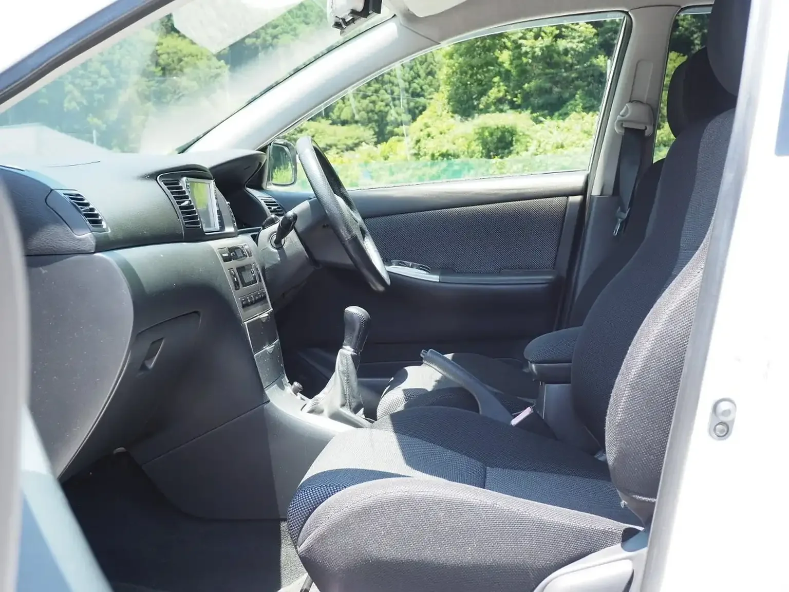 front passengers seat interior view toyota corolla runx aero tourer z 6 speed zze123 JDM export stock for sale japan