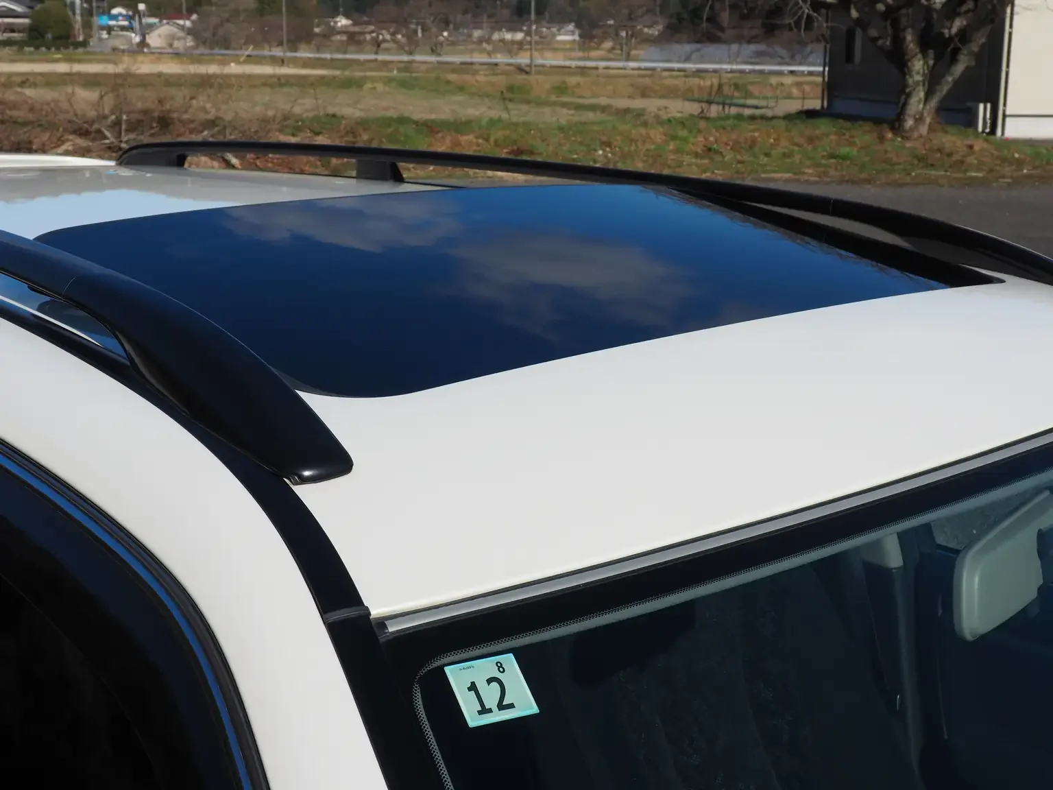 sunroof tilted up view pearl white toyota crown athlete four estate 2001 jdm export stock japan