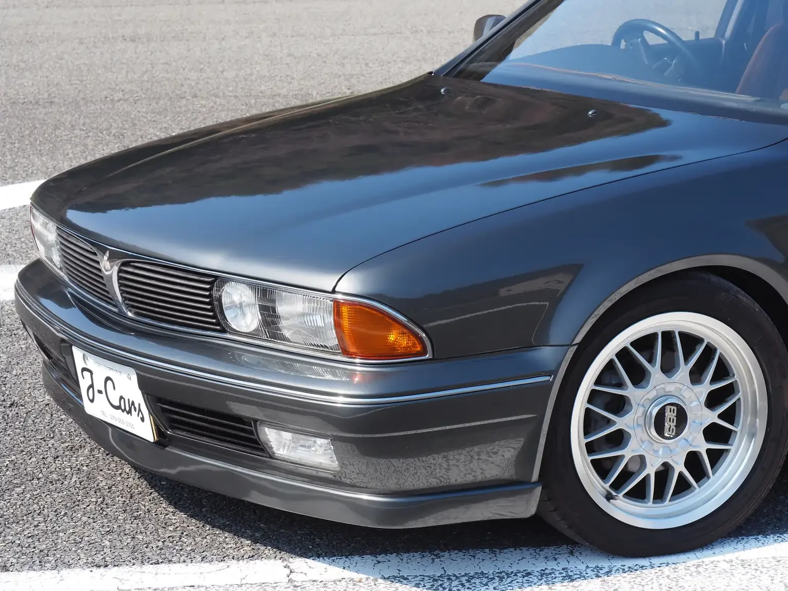 front-passengers-side-front-end-view-1991-mitsubishi-diamante-30rs-grey-jdm-export-vehicle-with-bbs-wheels-japan.webp