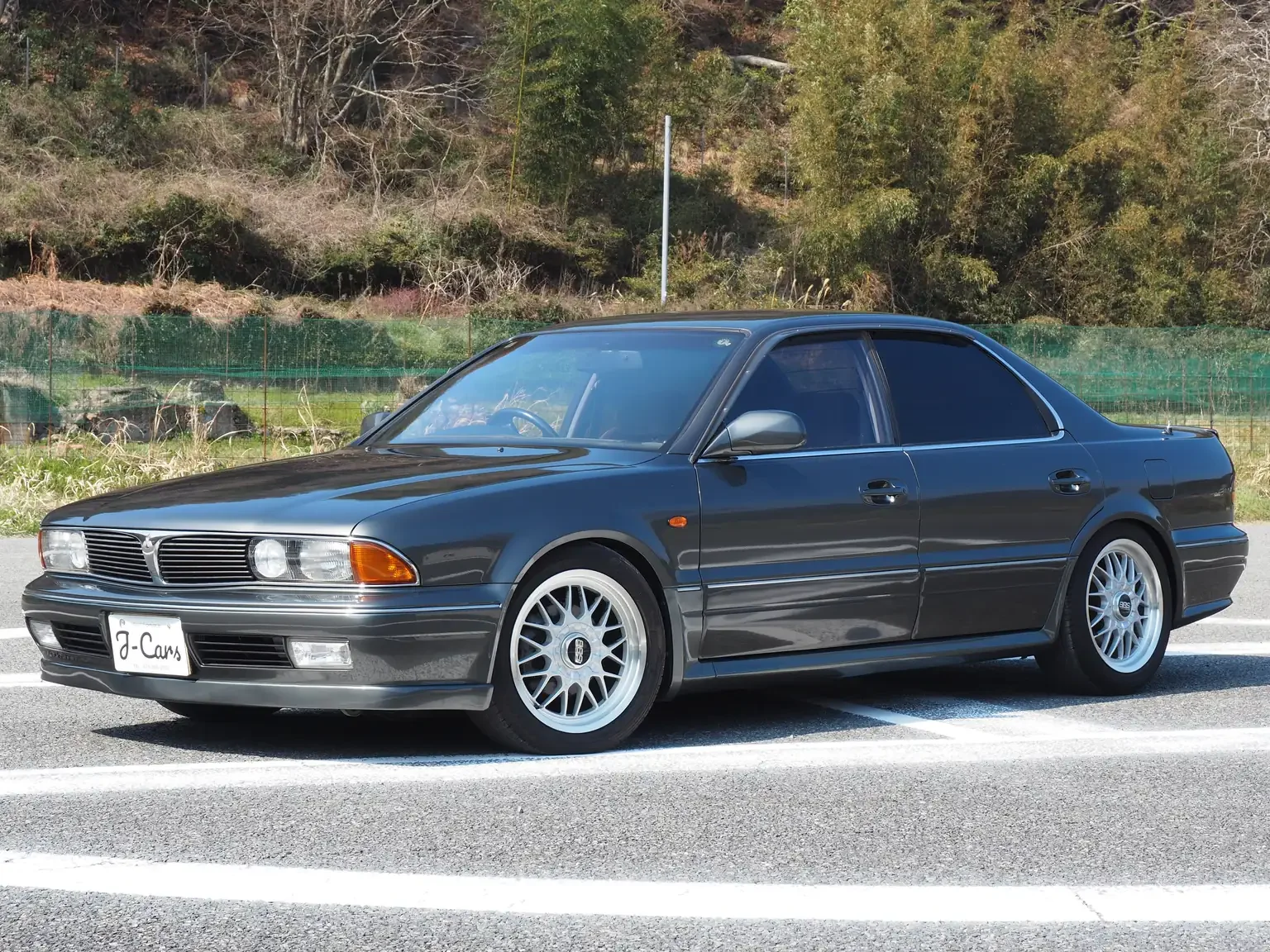 passengers-front-slight angle-side-view-1991-mitsubishi-diamante-30rs-grey-jdm-export-vehicle-japan.webp