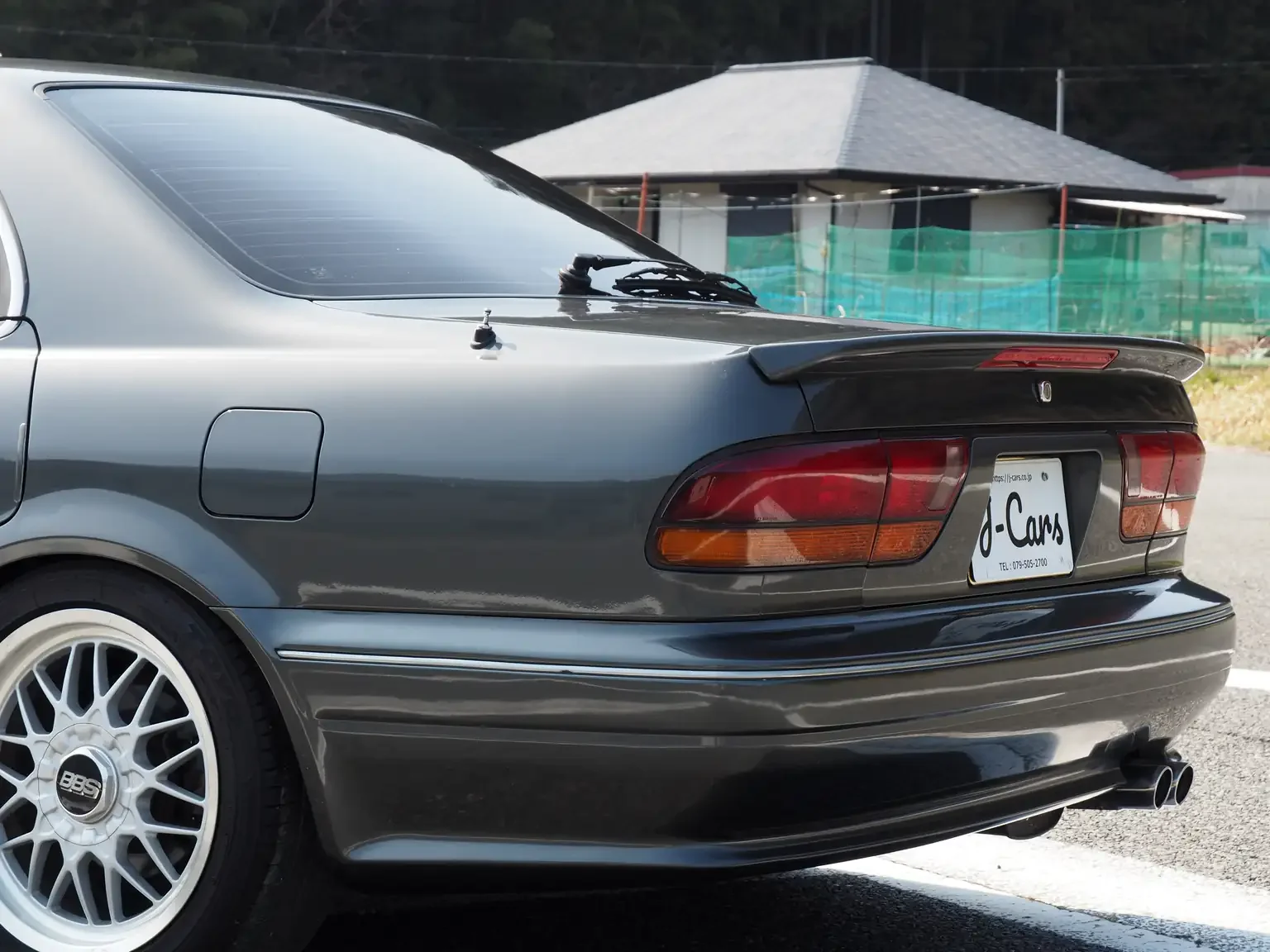 rear-end-view-left-side-1991-mitsubishi-diamante-30rs-grey-jdm-export-vehicle-japan.webp