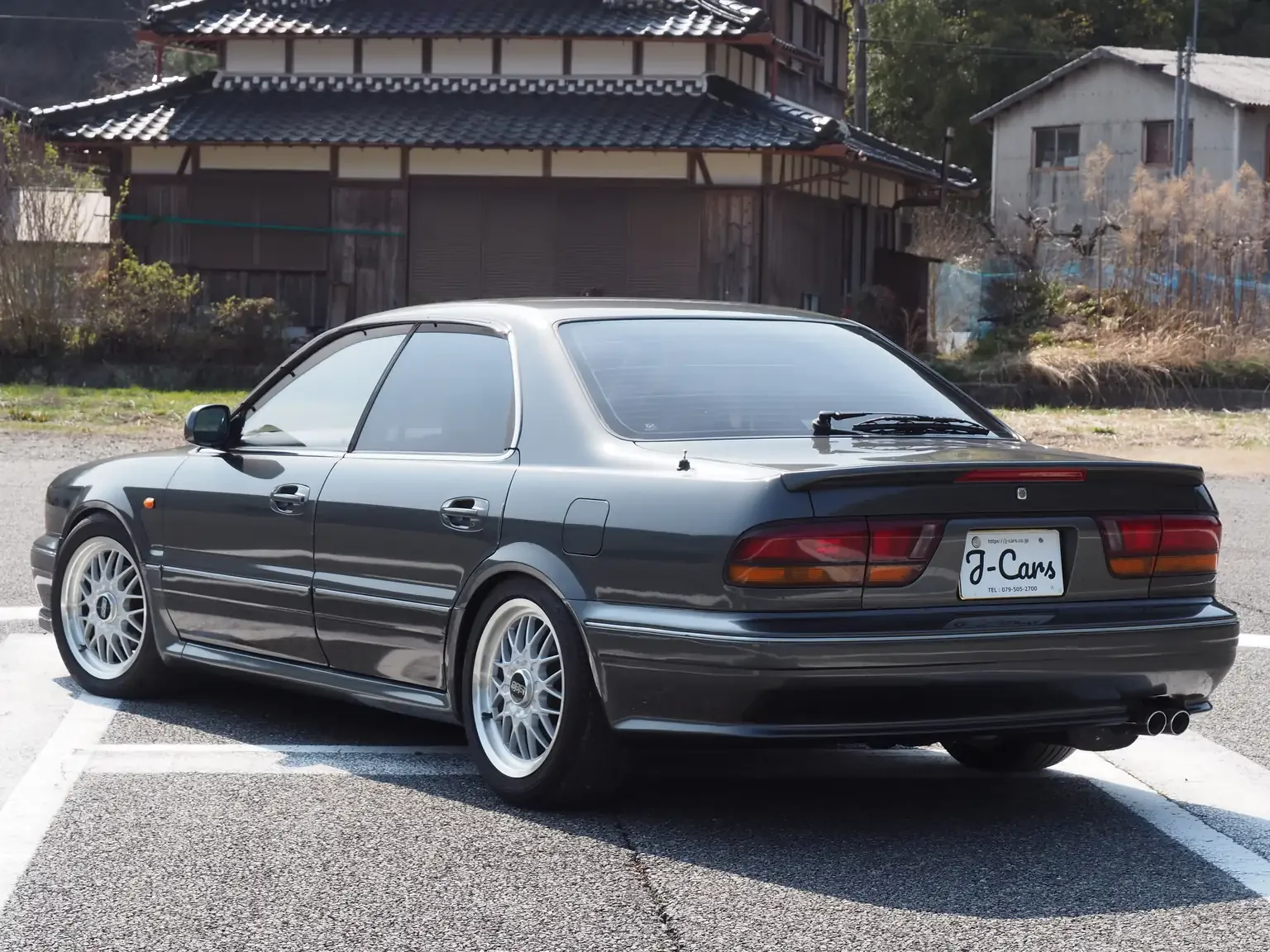 rear-passengers-side-angel-view-1991-mitsubishi-diamante-30rs-grey-jdm-export-vehicle-japan.webp