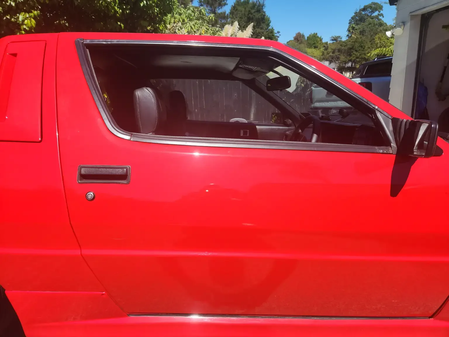 right hand door condition view red Mitsubishi Starion GSR II Turbo JDM spec NZ New export vehicle for sale New Zealand