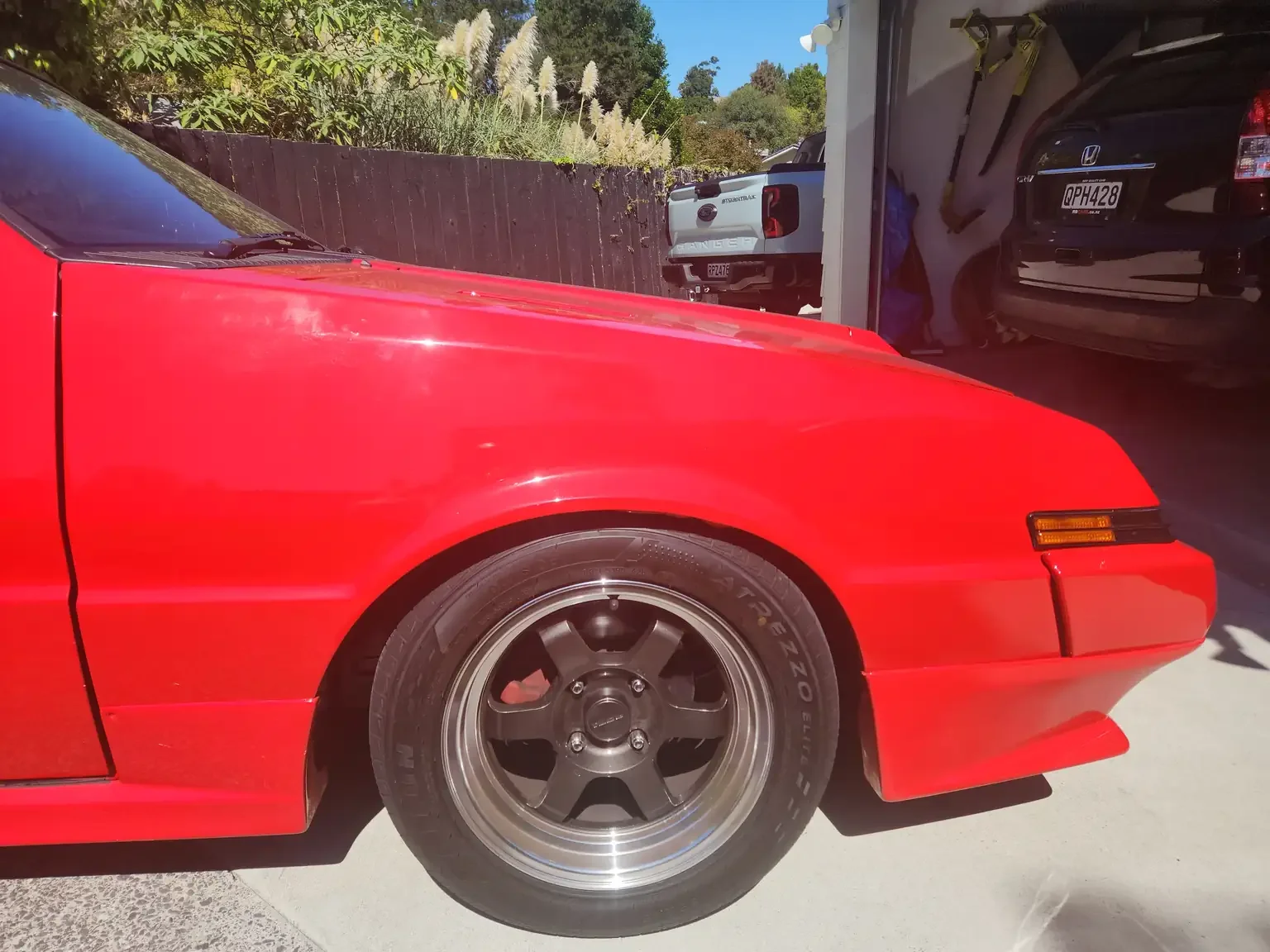 right hand front fender condition view red Mitsubishi Starion GSR II Turbo JDM spec NZ New export vehicle for sale New Zealand