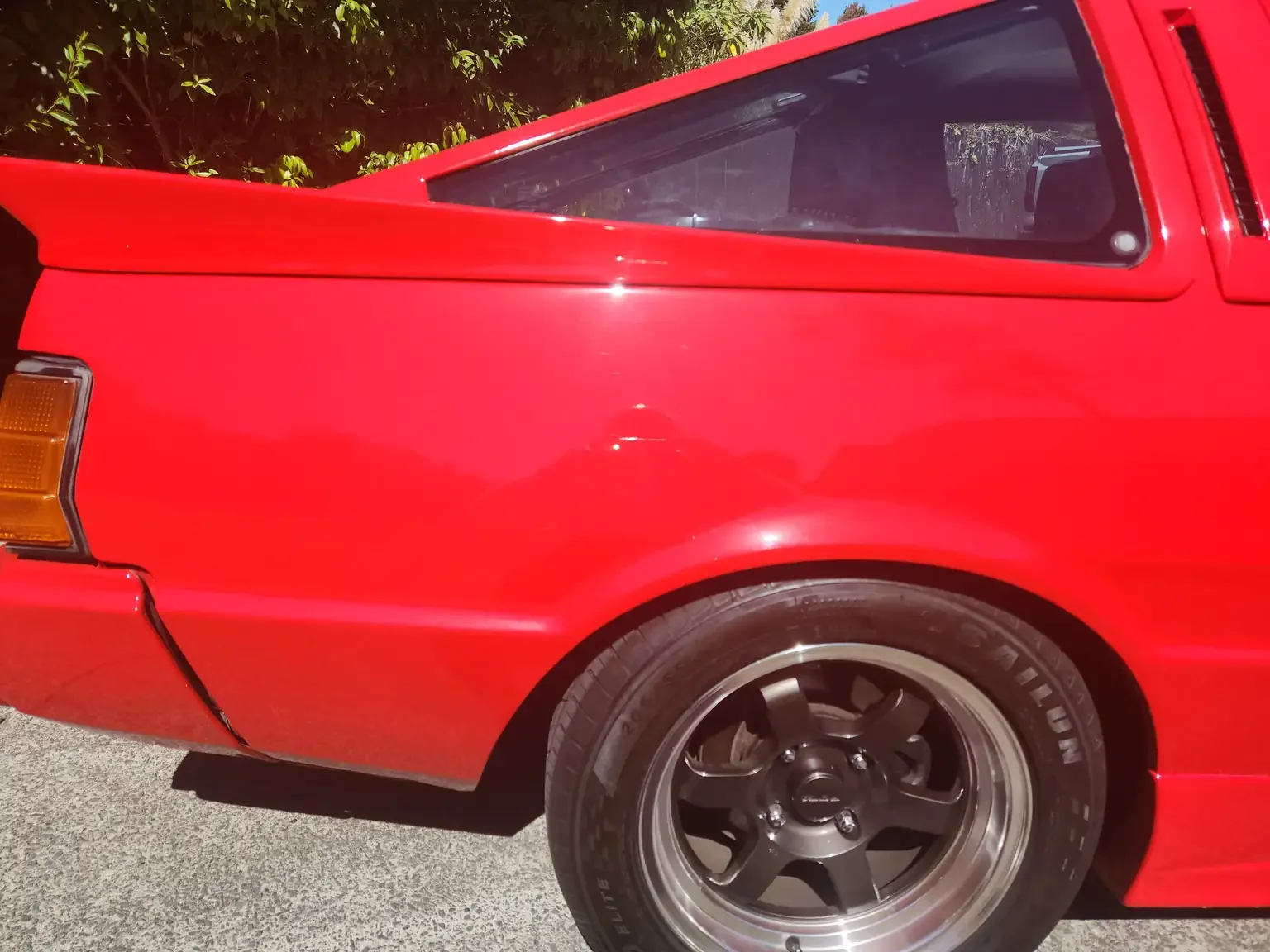 right hand rear quarter condition view red Mitsubishi Starion GSR II Turbo JDM spec NZ New export vehicle for sale New Zealand