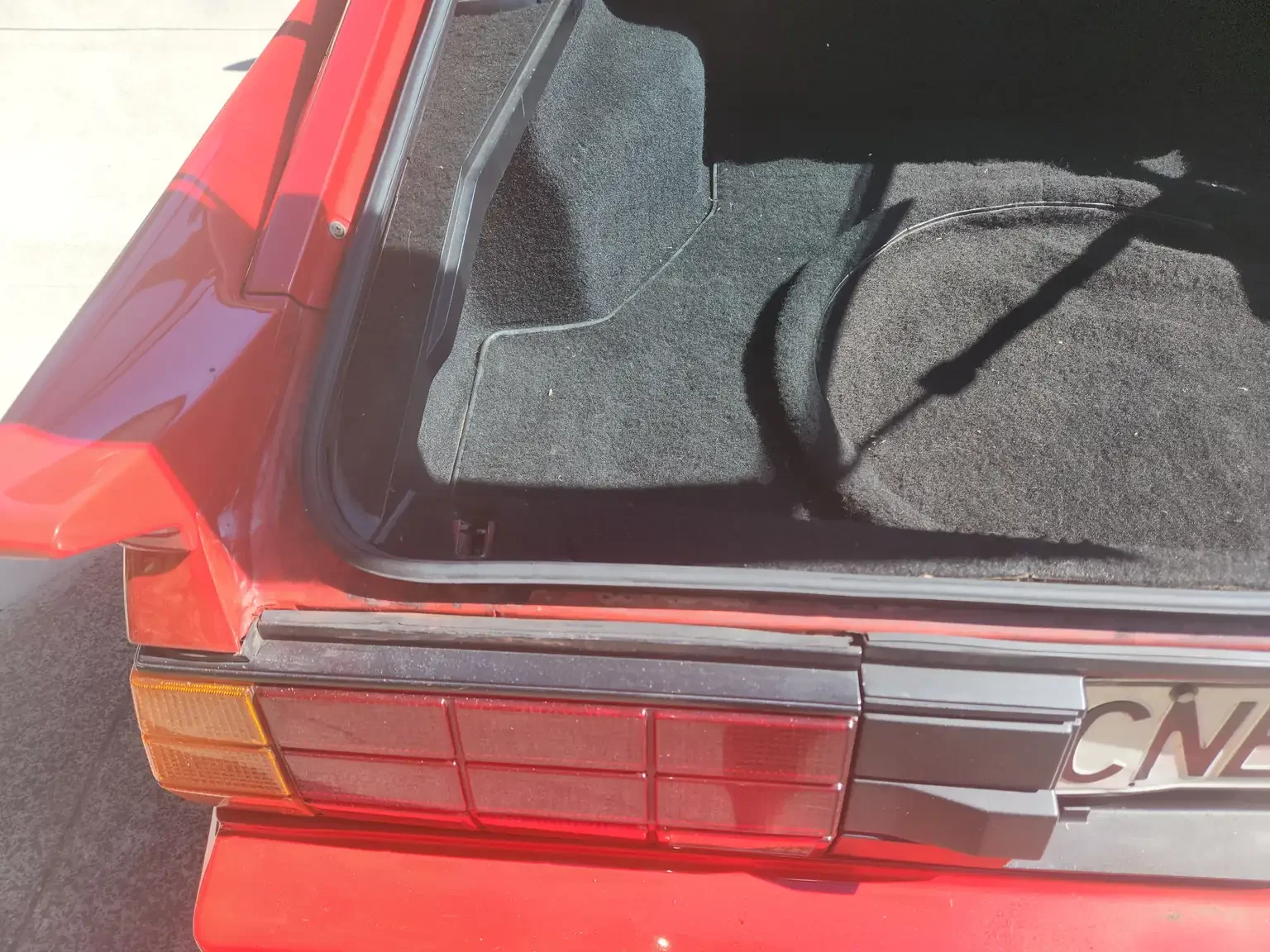 left hand side hatch gutter condition view red Mitsubishi Starion GSR II Turbo JDM spec NZ New export vehicle for sale New Zealand