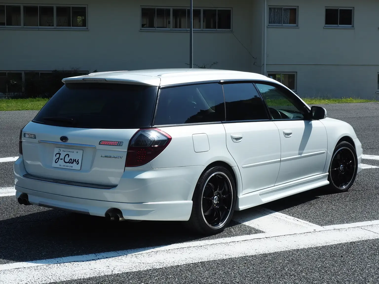 Rear divers side view white subaru legacy 3.0R B-Spec 6MT jdm export stock japan