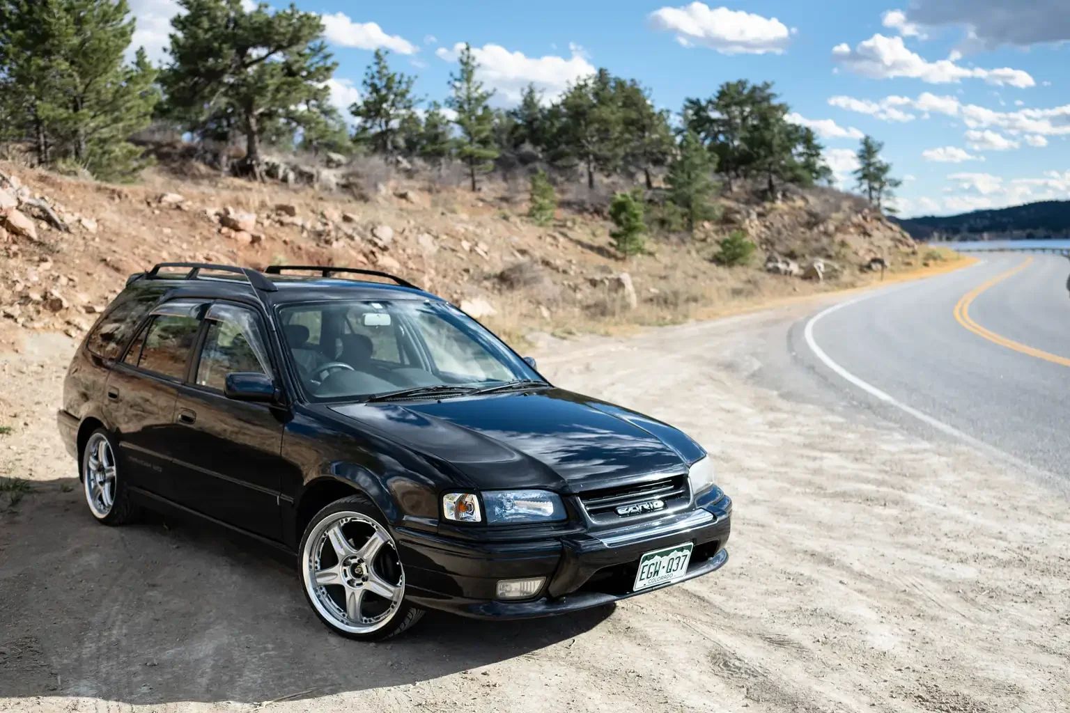front drivers side angle view toyota sprinter carib bz touring 4age 6MT black usa legal jdm vehicle with title for sale colorado USA