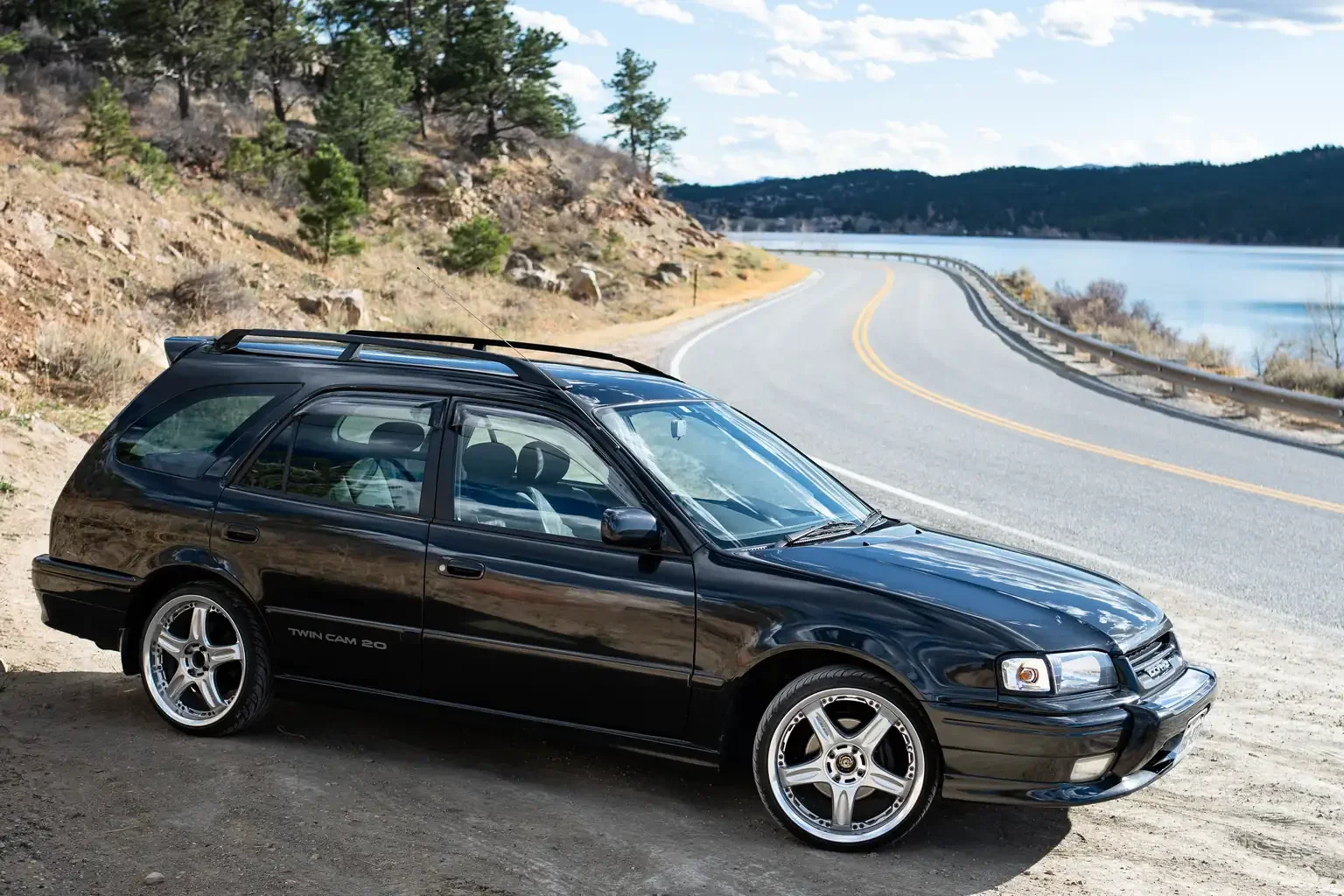 drivers side angle view toyota sprinter carib bz touring 4age 6MT black usa legal jdm vehicle with title for sale colorado USA