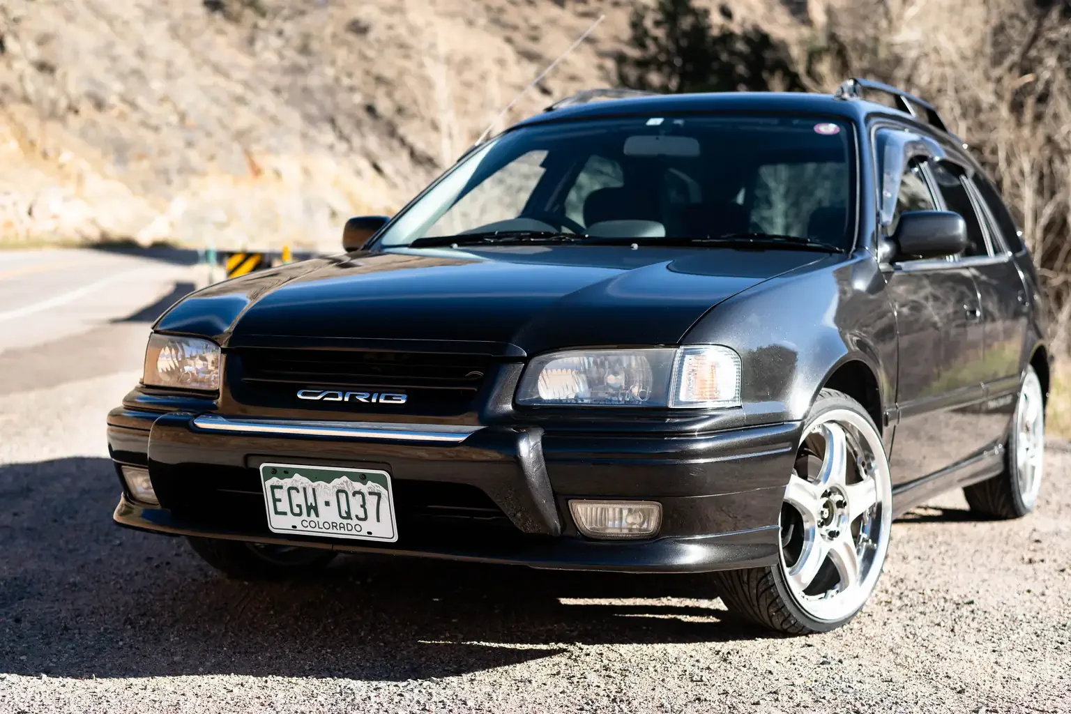 front passengers angle view toyota sprinter carib bz touring 4age 6MT black usa legal jdm vehicle with title for sale colorado USA