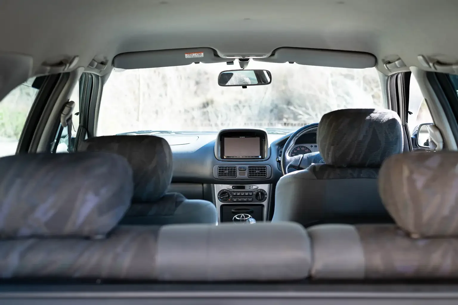 look through view of interior from rear seat back view toyota sprinter carib bz touring 4age 6MT black usa legal jdm vehicle with title for sale colorado USA