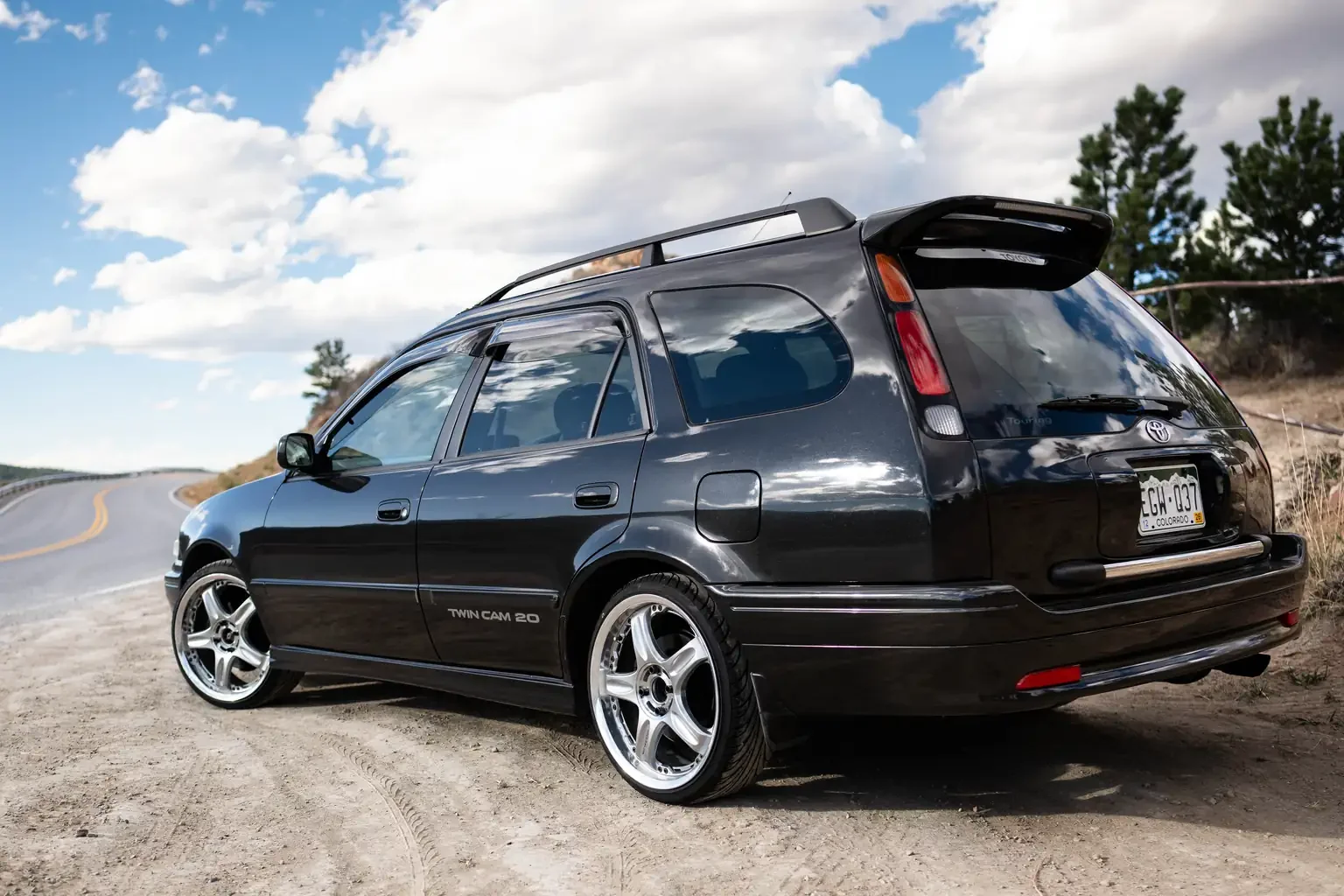 passengers rear angle view view toyota sprinter carib bz touring 4age 6MT black usa legal jdm vehicle with title for sale colorado USA