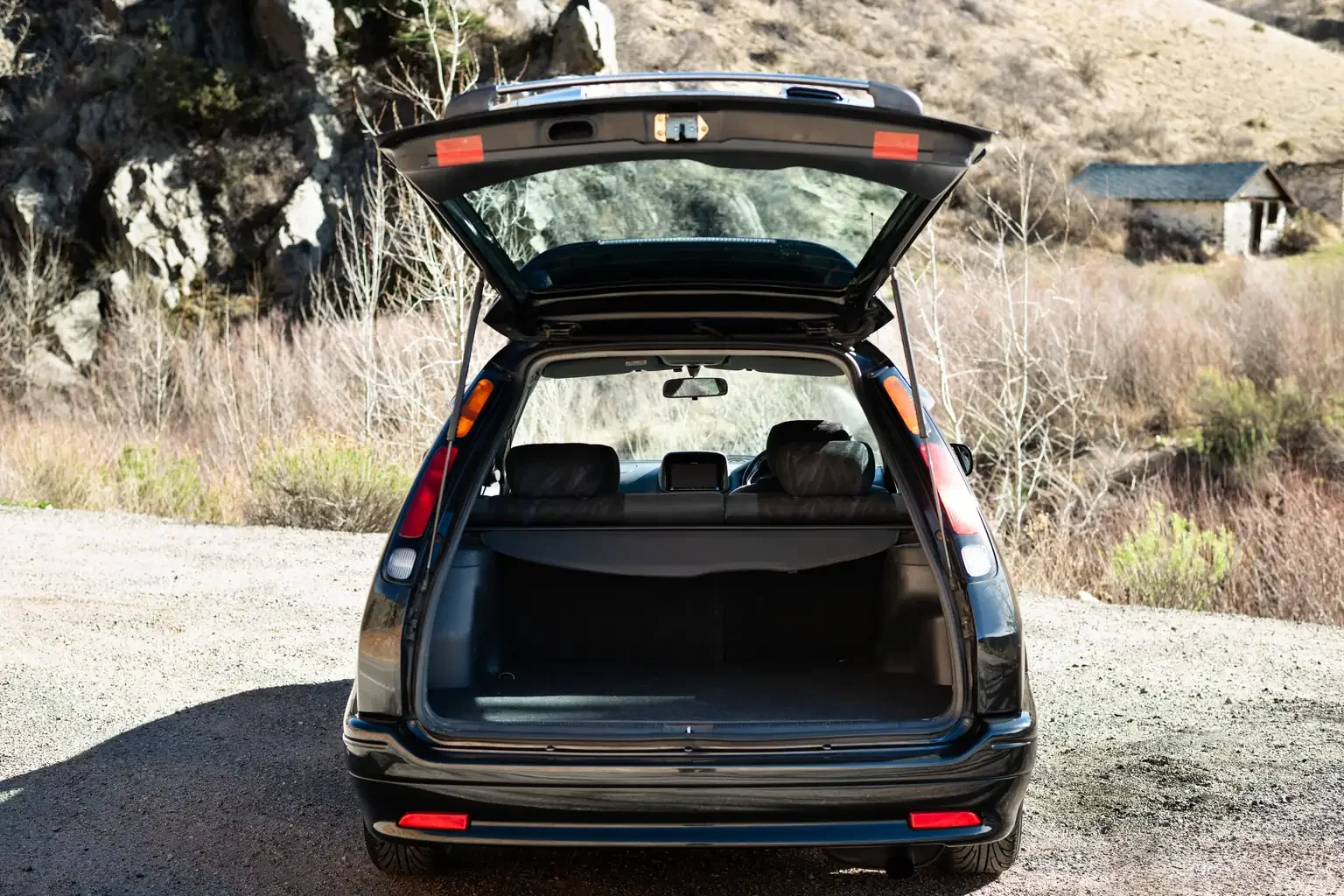 rear end view with tailgate open toyota sprinter carib bz touring 4age 6MT black usa legal jdm vehicle with title for sale colorado USA