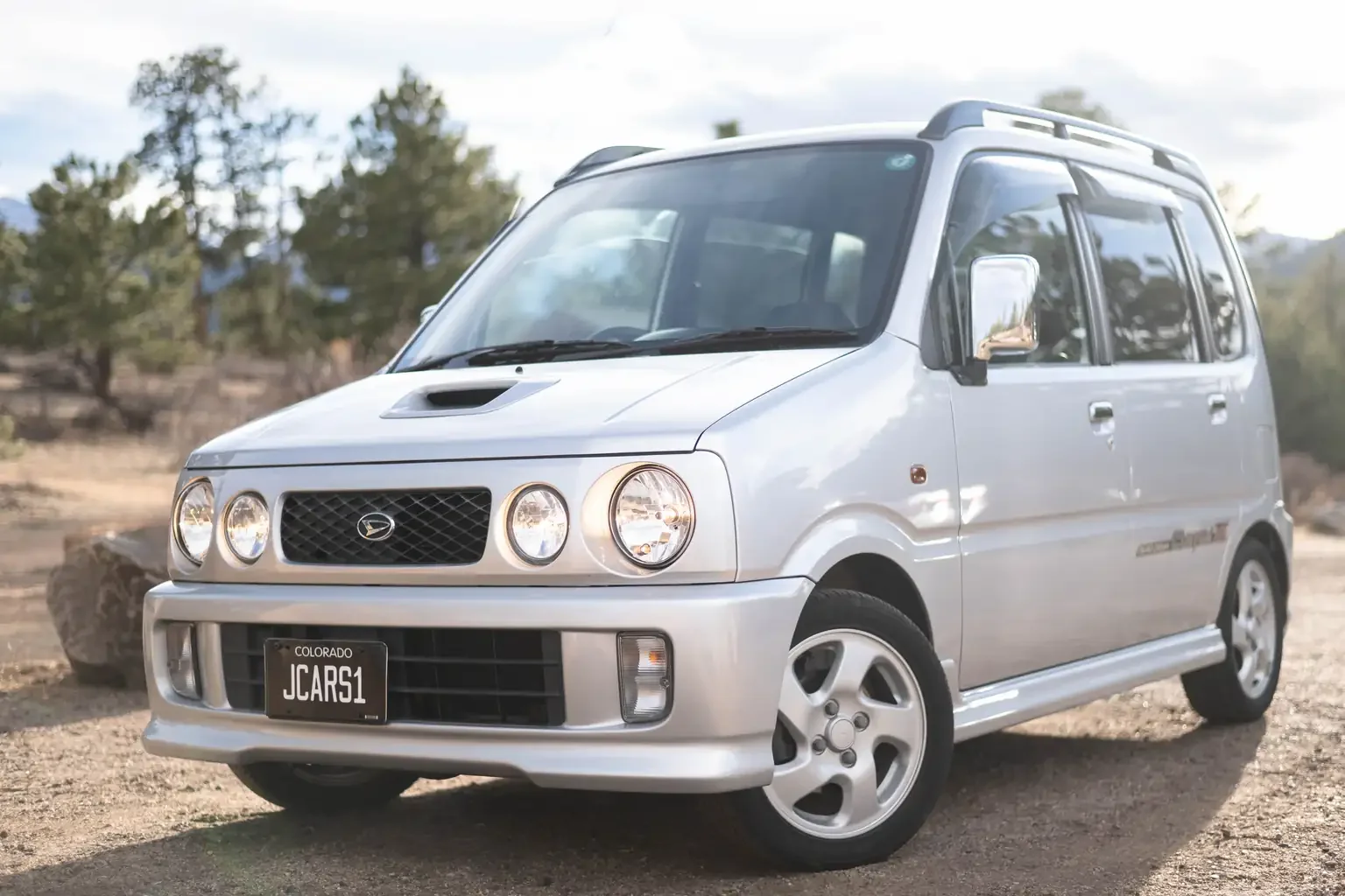 front passenger angle view of silver daihatsu move custom aero down xx turbo usa legal jdm vehicle with title for sale colorado USA