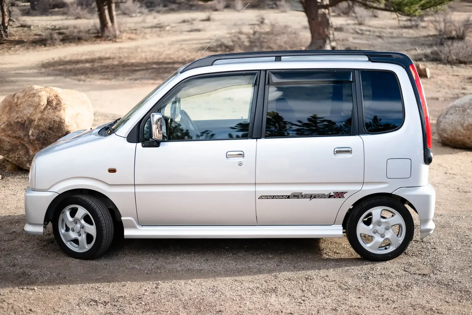 passengers side view silver daihatsu move custom aero down xx turbo usa legal jdm vehicle with title for sale colorado USA