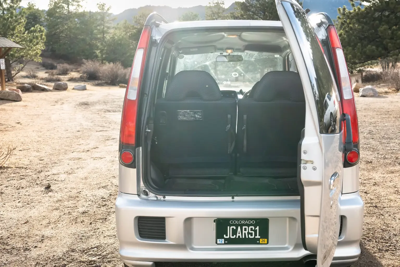 side swing tail gate open view silver daihatsu move custom aero down xx turbo usa legal jdm vehicle with title for sale colorado USA
