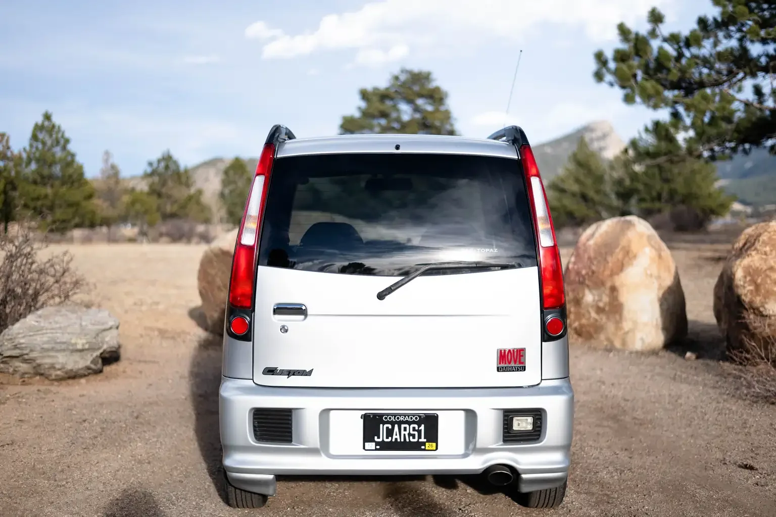 rear end view silver daihatsu move custom aero down xx turbo usa legal jdm vehicle with title for sale colorado USA
