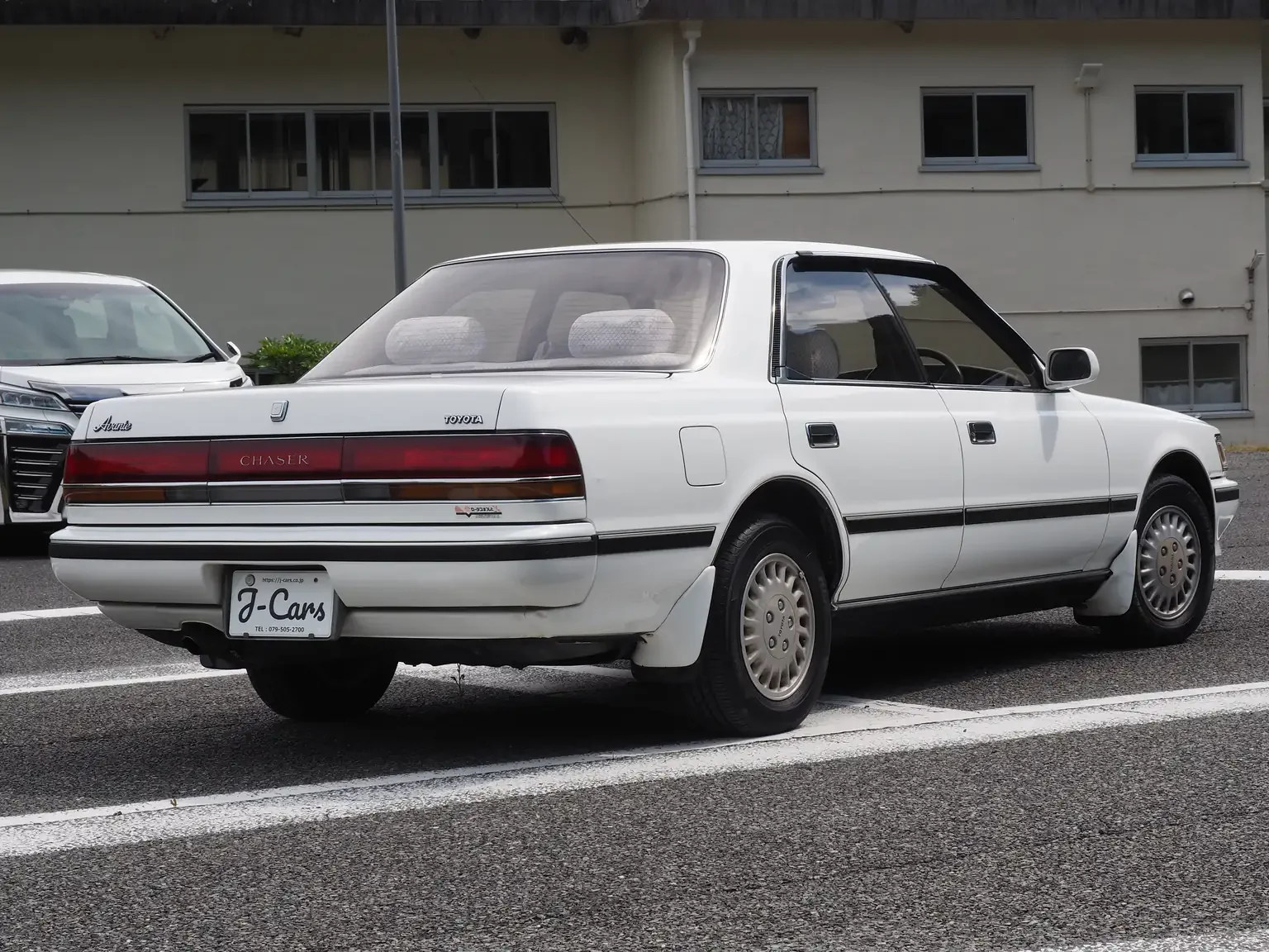 rear drivers side angle view white 1990 toyota chaser gx81 jdm export stock japan