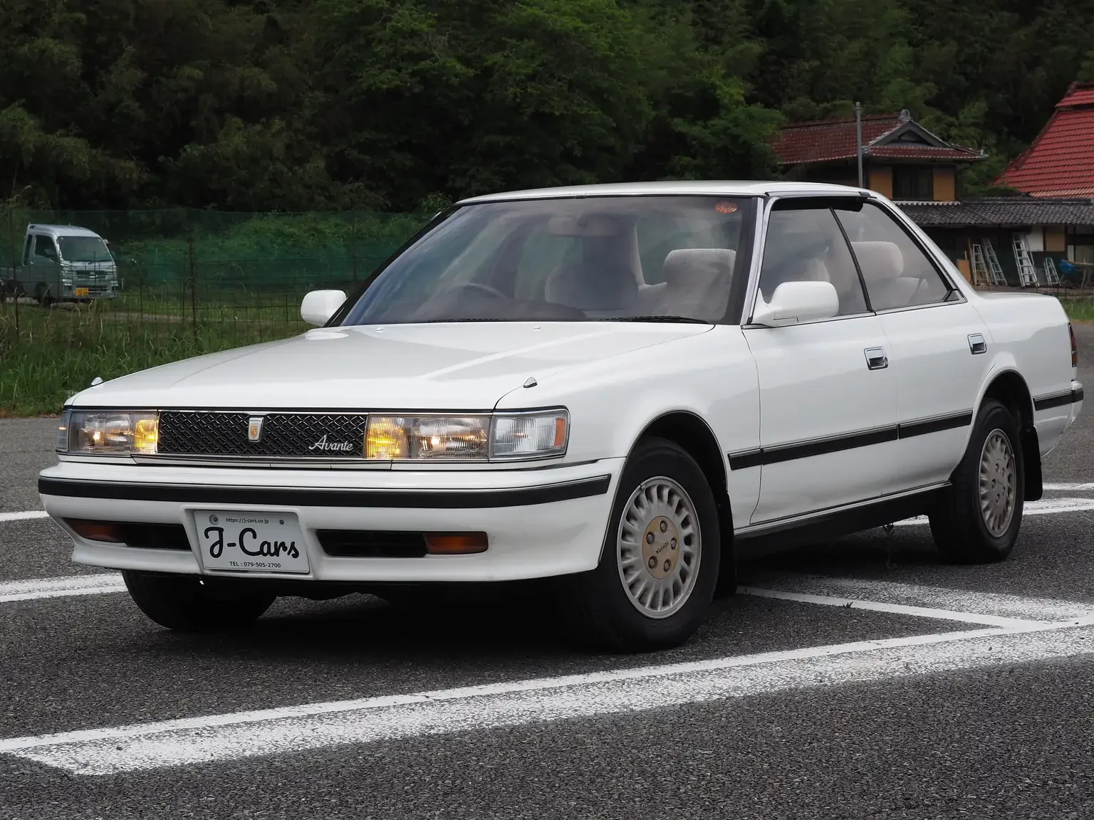 passenger side front angle view white 1990 toyota chaser gx81 jdm export stock japan