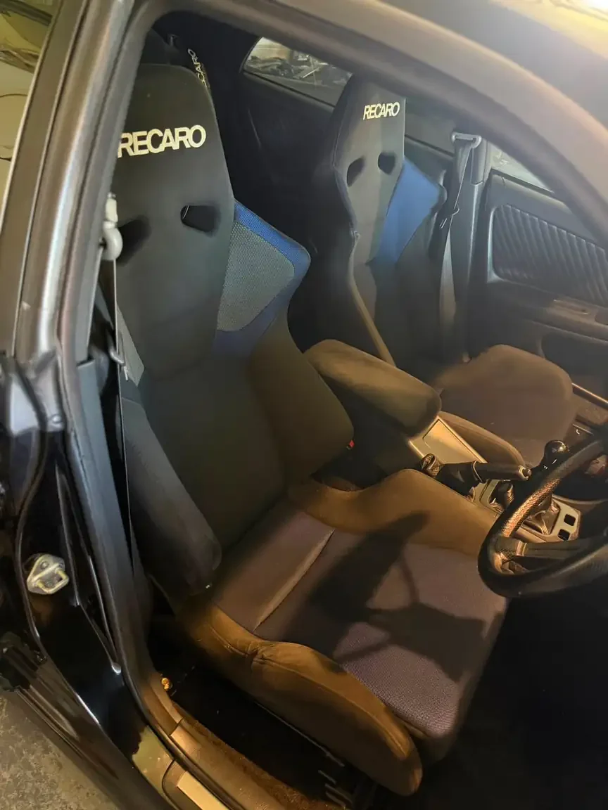 sr6 recaro seat drivers door peak through view black toyota chaser tourer v jzx100 custom steel wide body jdm export vehicle new zealand