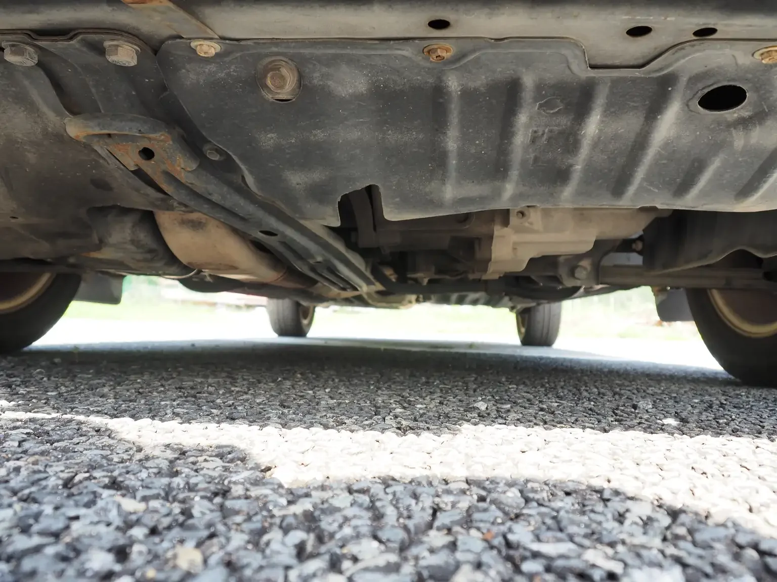 front under carriage condition view of 1989 Nissan sunny super saloon twin cam NISMO in black jdm export vehicle Japan