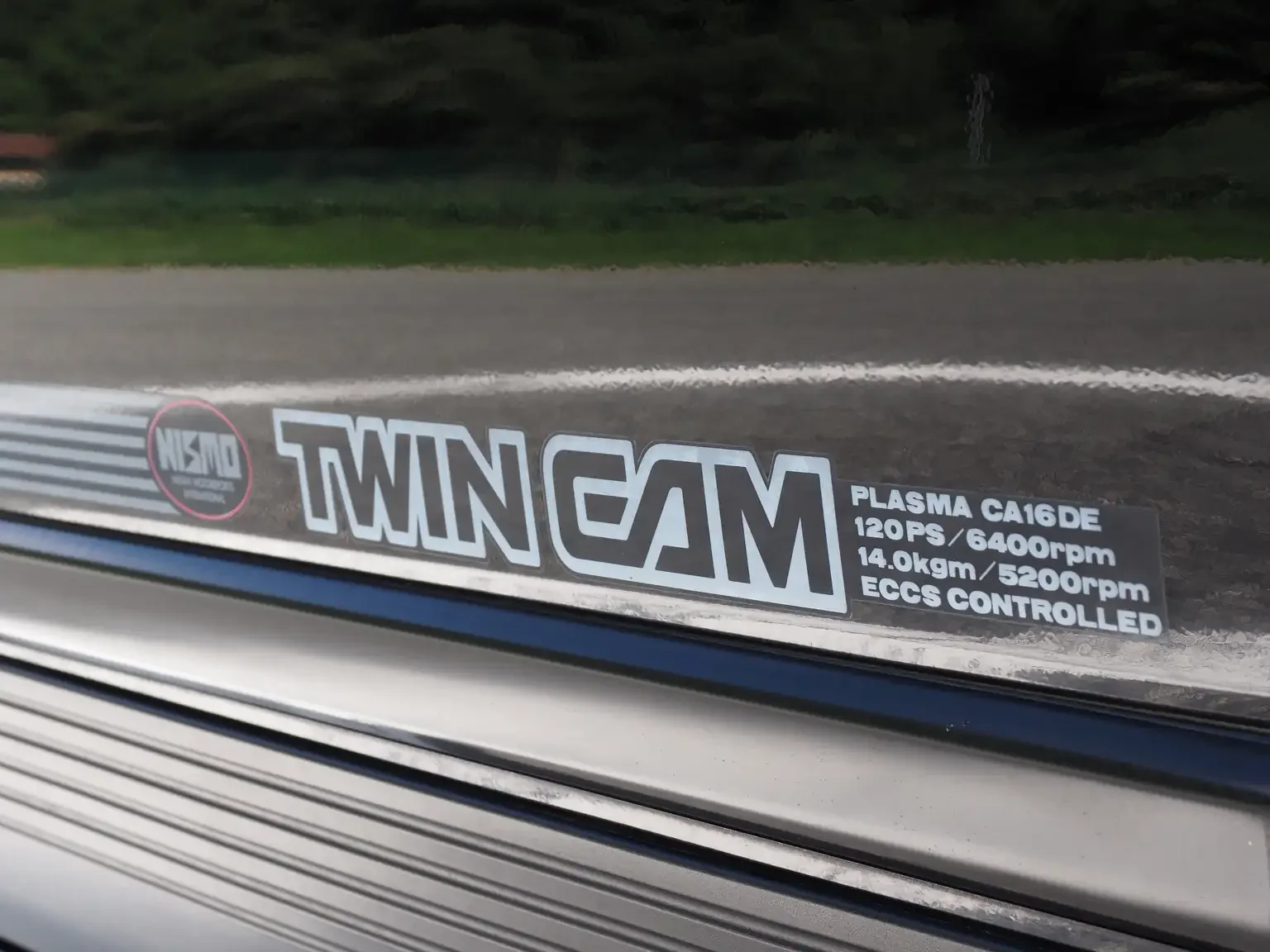 nismo twin cam door decal view of 1989 Nissan sunny super saloon twin cam NISMO in black jdm export vehicle Japan