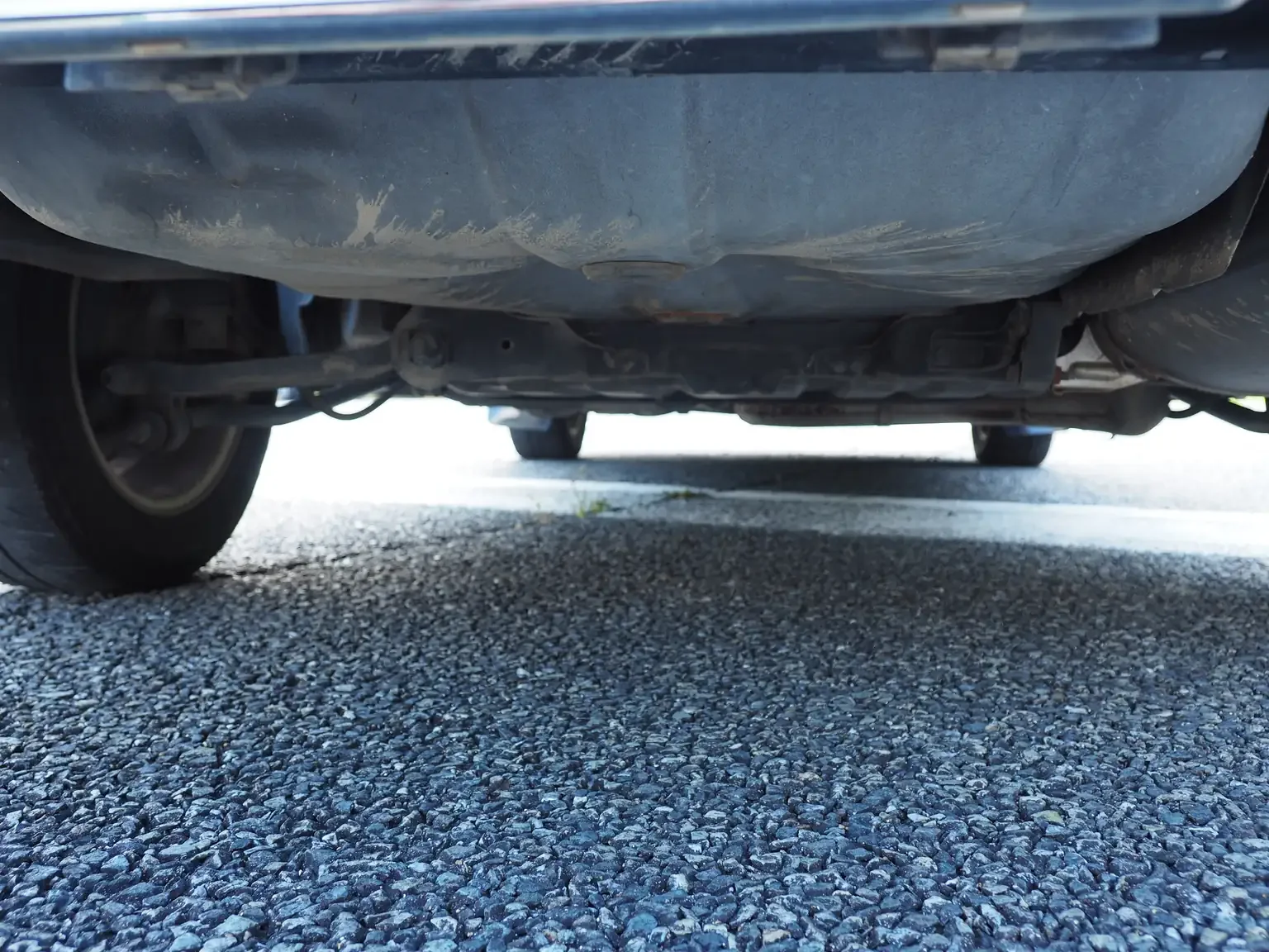 rear undercarriage condition view of 1989 Nissan sunny super saloon twin cam NISMO in black jdm export vehicle Japan