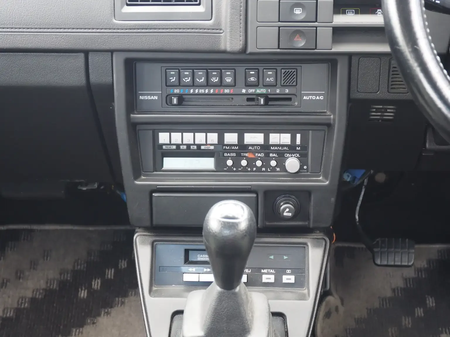 auto air con panel view of 1989 Nissan sunny super saloon twin cam NISMO in black jdm export vehicle Japan