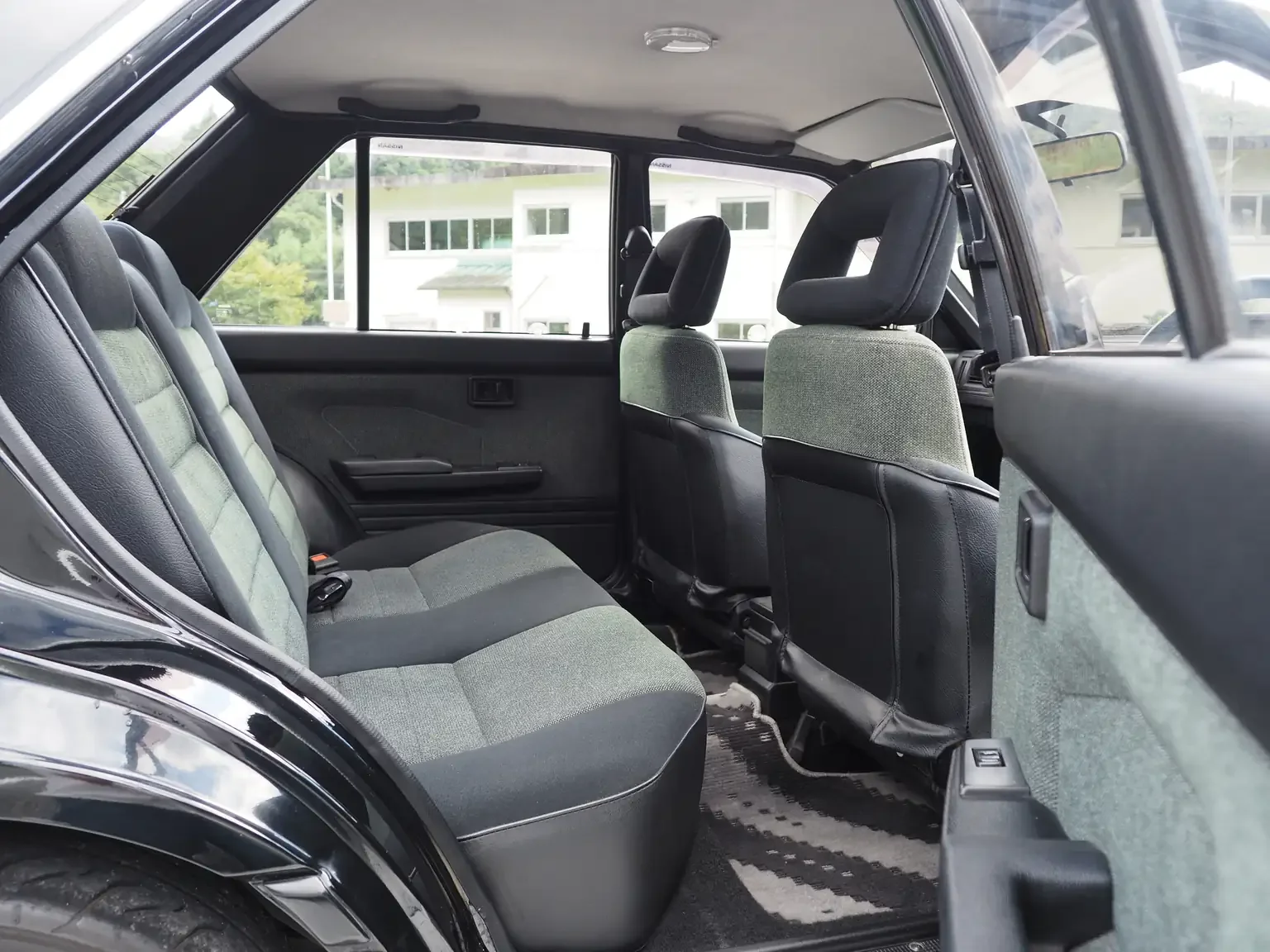 nismo rear interior view of 1989 Nissan sunny super saloon twin cam NISMO in black jdm export vehicle Japan