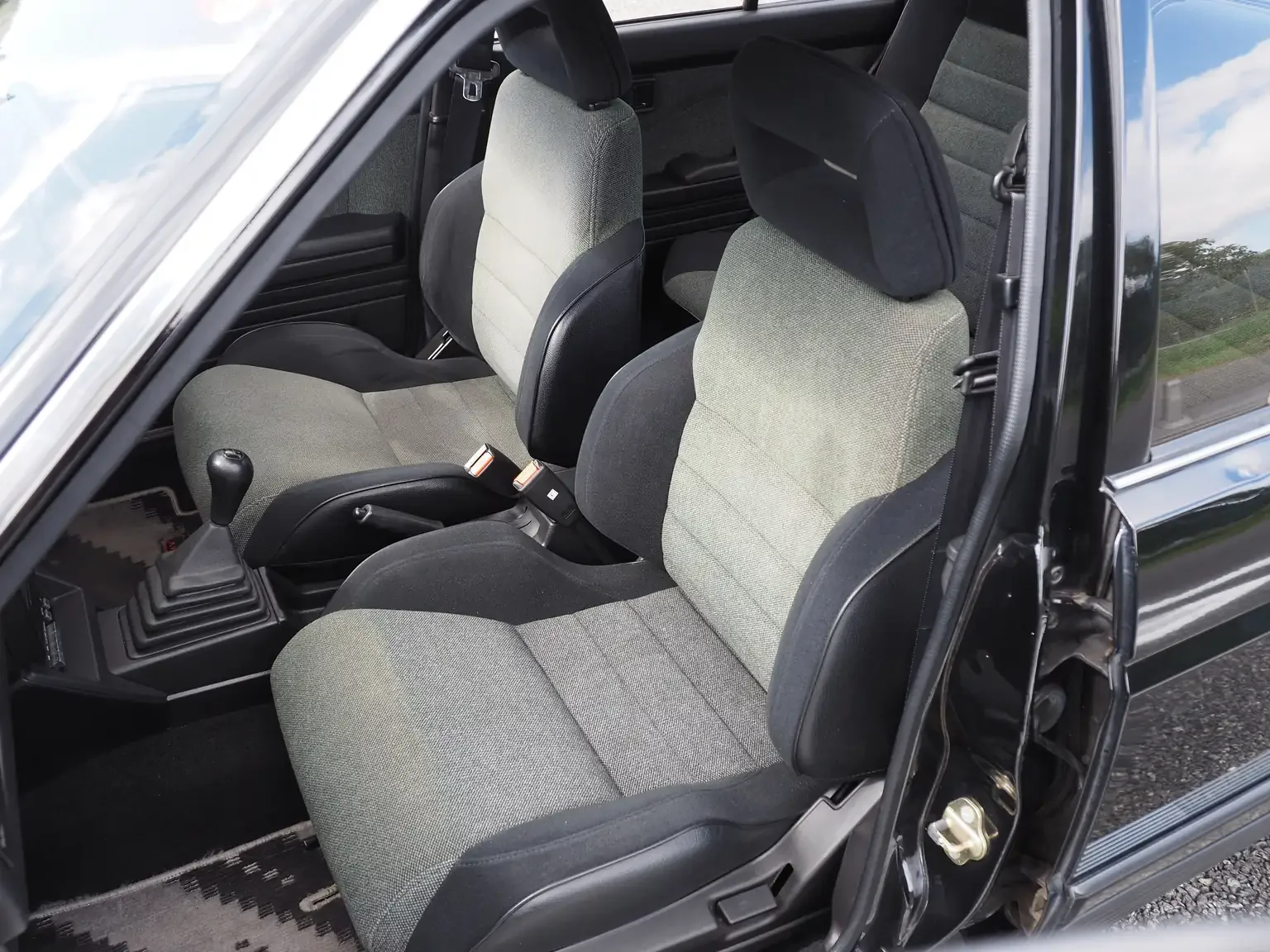 nismo passengers seat view of 1989 Nissan sunny super saloon twin cam NISMO in black jdm export vehicle Japan