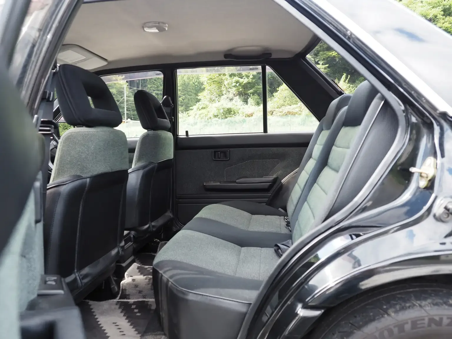 nismo rear interior view of 1989 Nissan sunny super saloon twin cam NISMO in black jdm export vehicle Japan