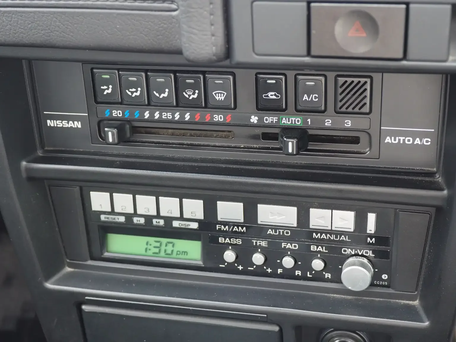 oe radio view of 1989 Nissan sunny super saloon twin cam NISMO in black jdm export vehicle Japan