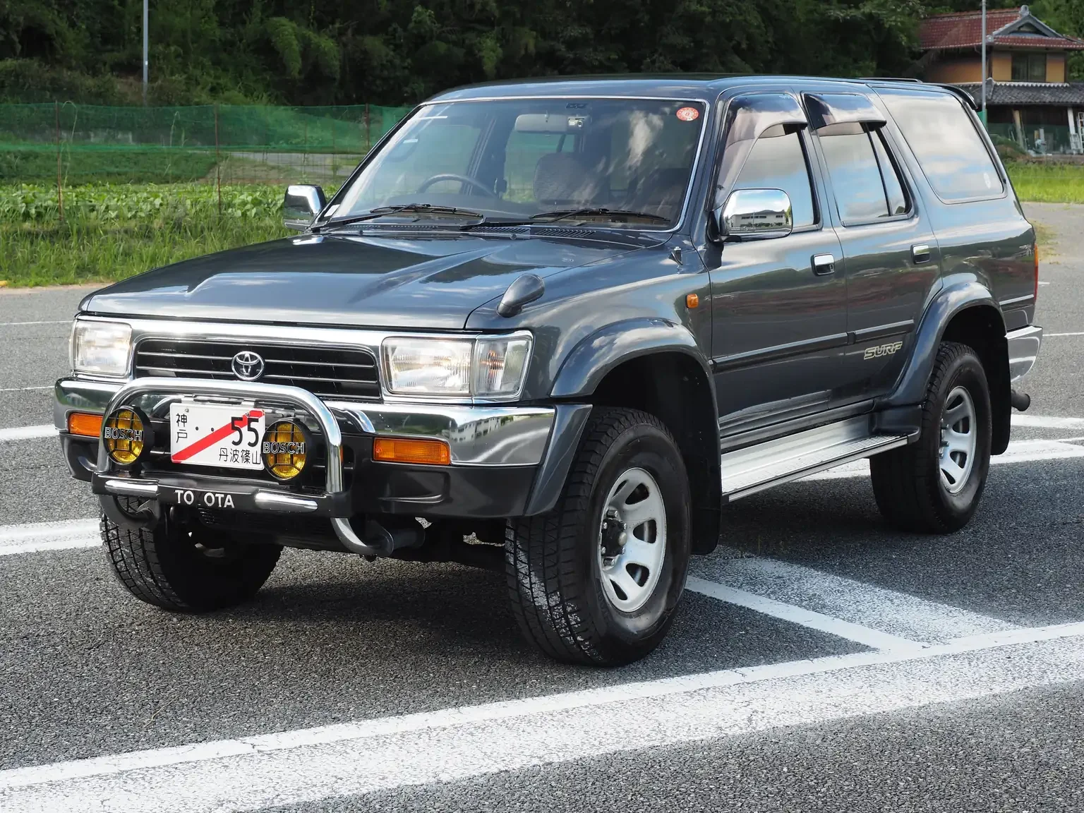 front passengers angle view grey toyota hilux surf kzn130 1kzte 5 speed manual diesel turbo JDM export vehicle Japan