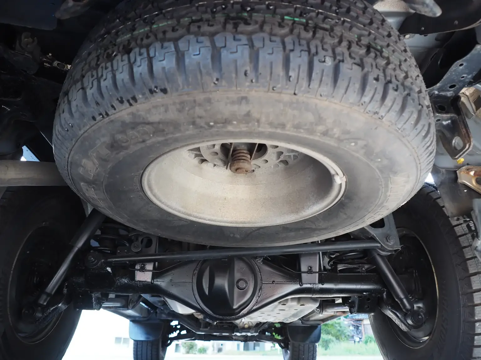 under carriage condition view grey toyota hilux surf kzn130 1kzte 5 speed manual diesel turbo JDM export vehicle Japan