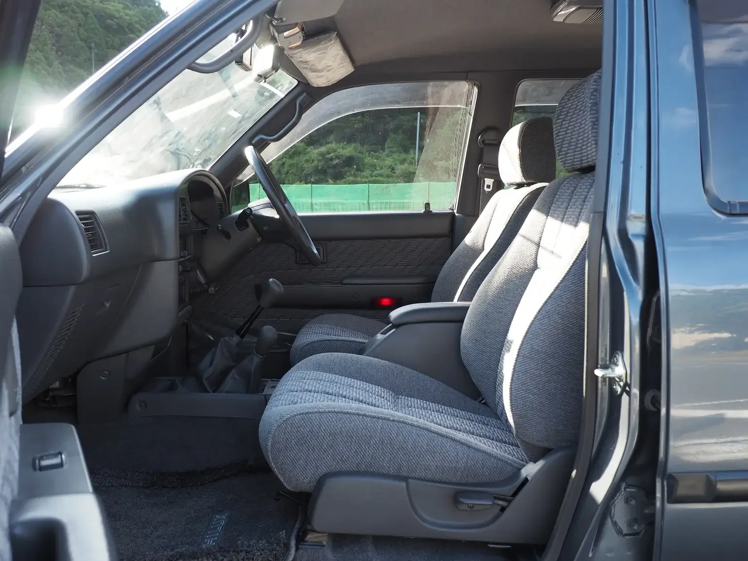 front passenger seat interior view grey toyota hilux surf kzn130 1kzte 5 speed manual diesel turbo JDM export vehicle Japan