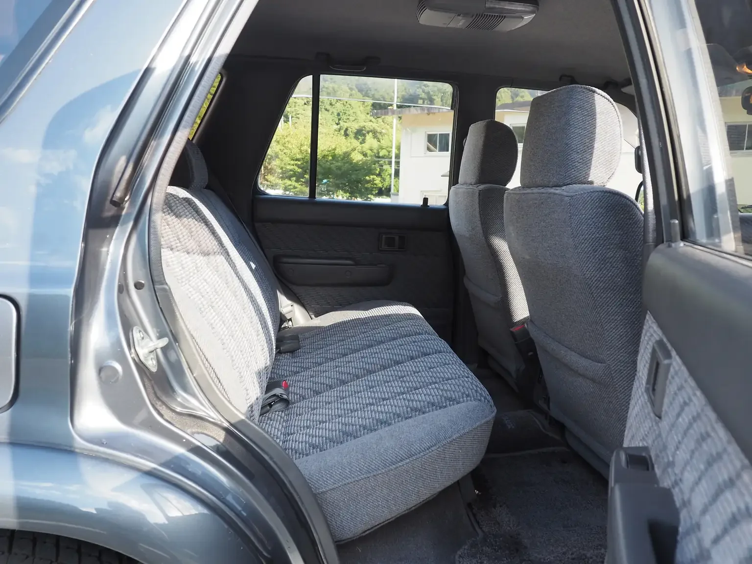 rear interior seat view grey toyota hilux surf kzn130 1kzte 5 speed manual diesel turbo JDM export vehicle Japan