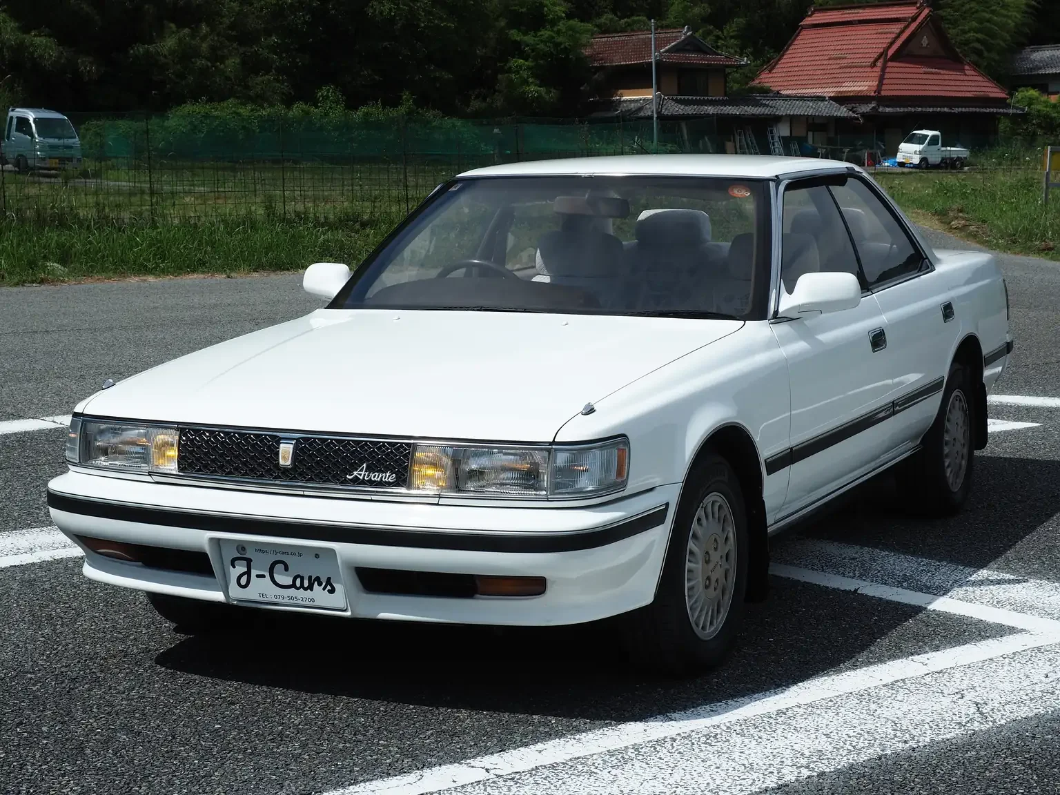 front passengers angle view of white pre facelift 1990 Toyota Chaser GX81 jdm export stock japan