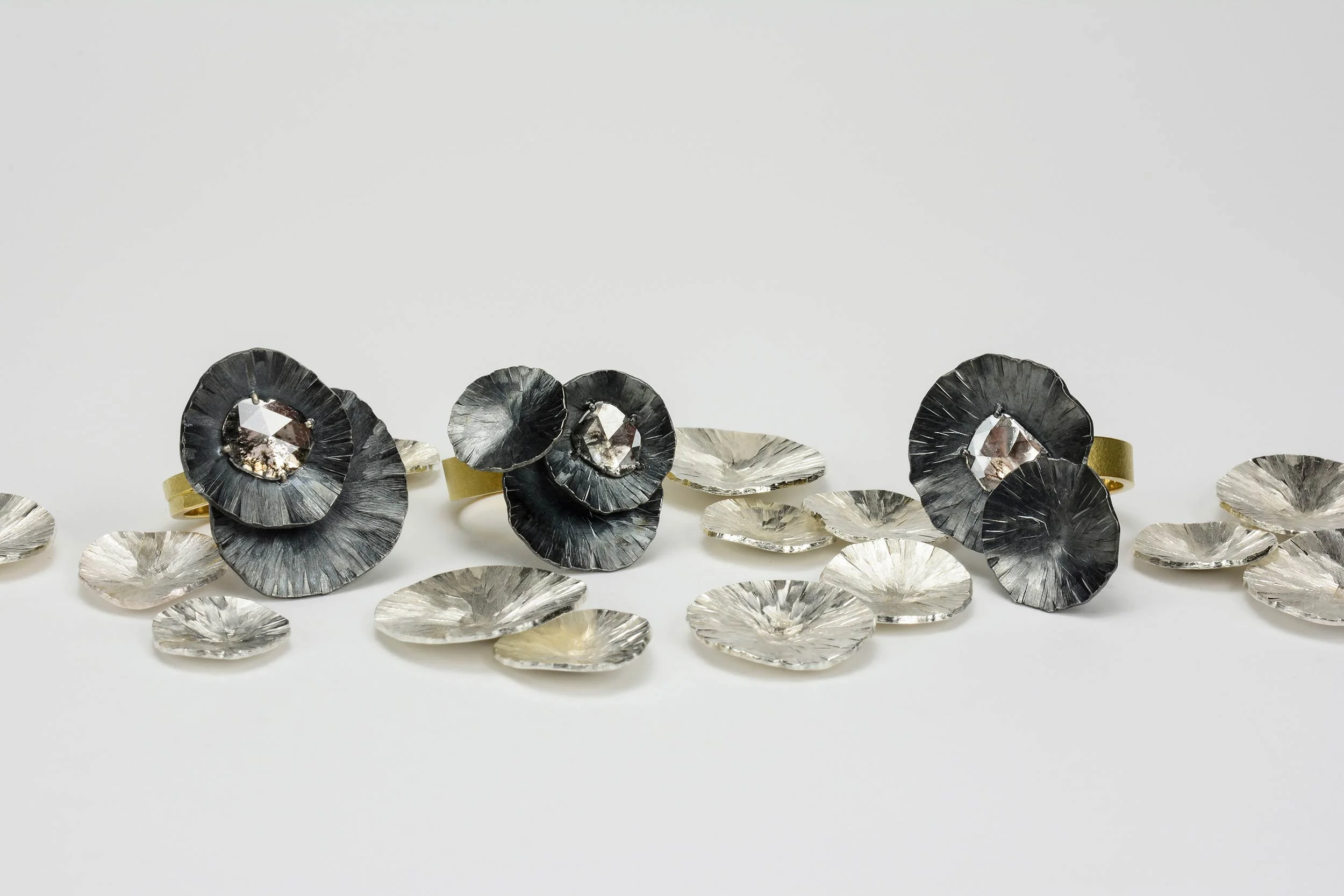 diamond-slice-lily-pad-rings.jpg