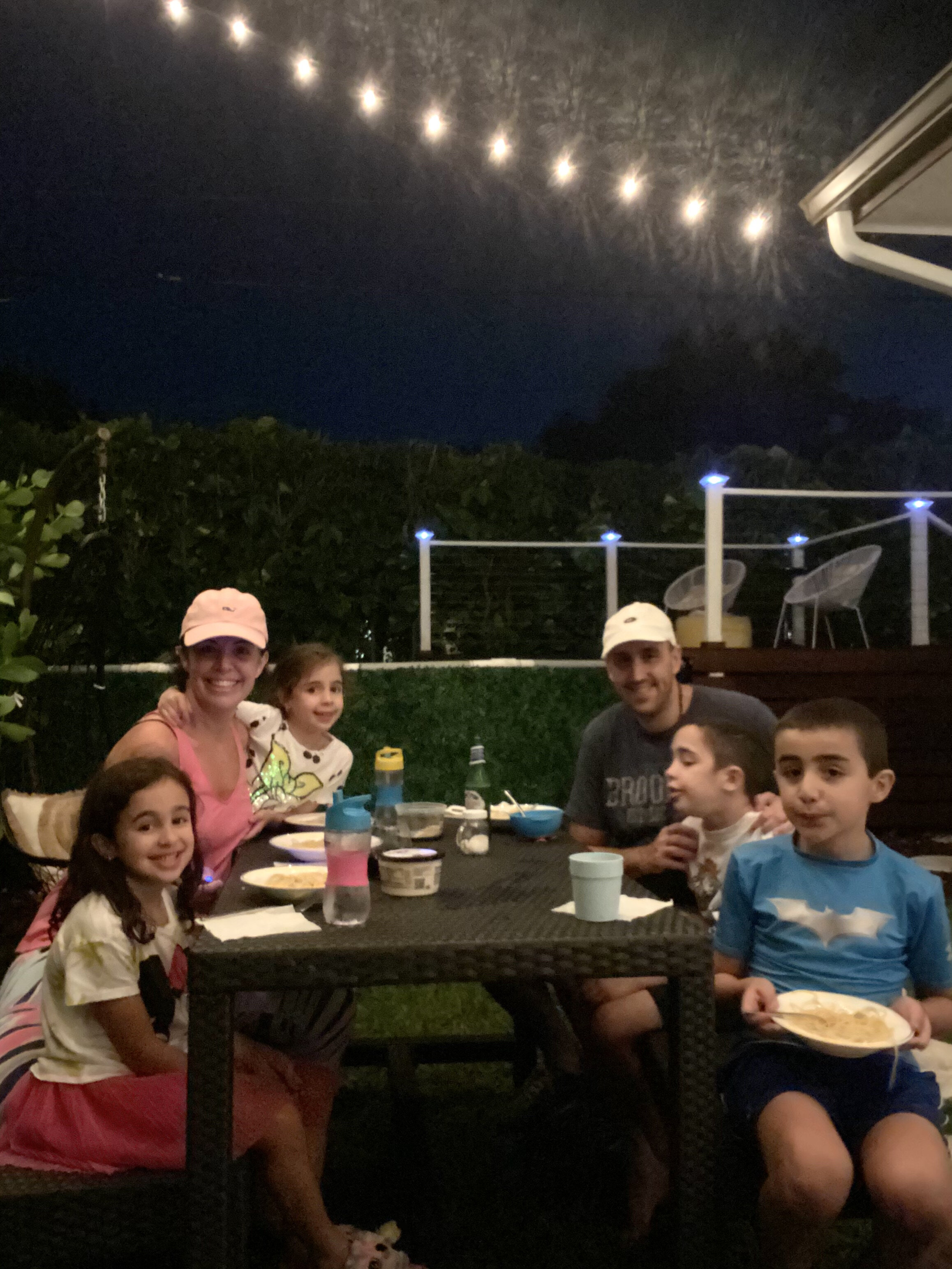 Enjoying our first outdoor family dinner in our newly design backyard