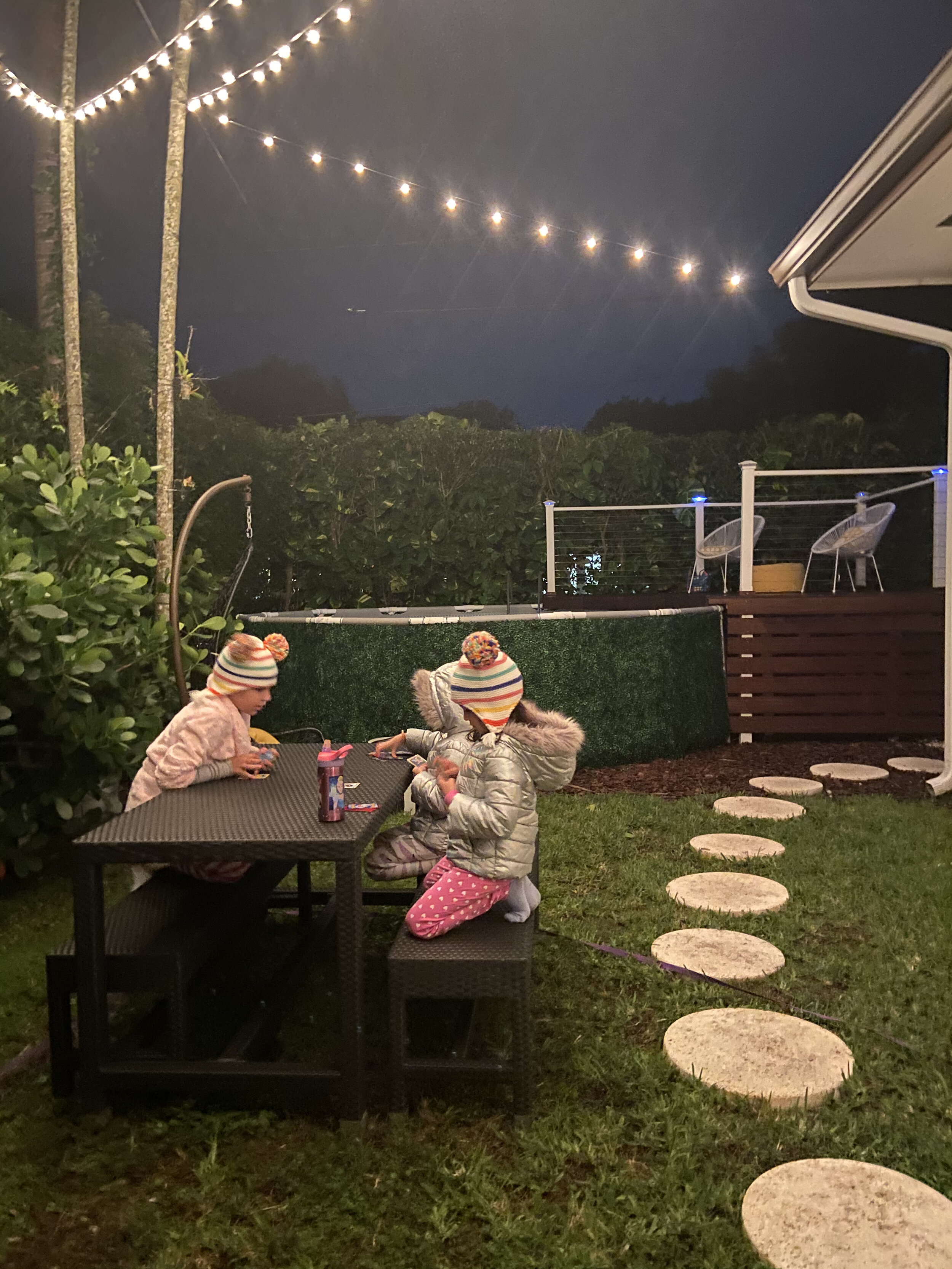 Miami Winter nights under bistro lights in our newly designed backyard