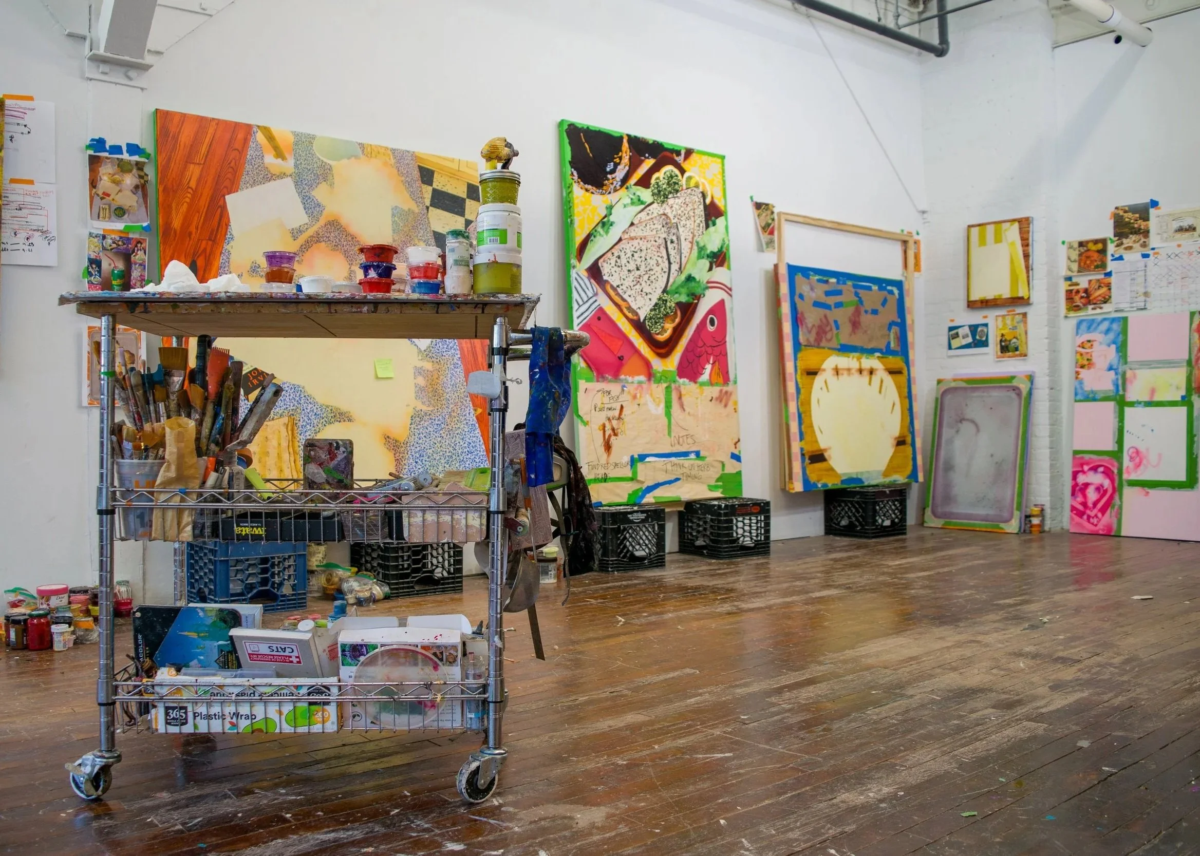 Abbi Kenny's studio at The Shirt Factory with in progress works propped against the walls.
