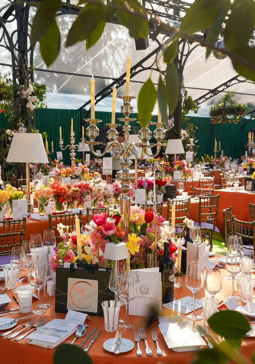 tulip filled tables in a marquee
