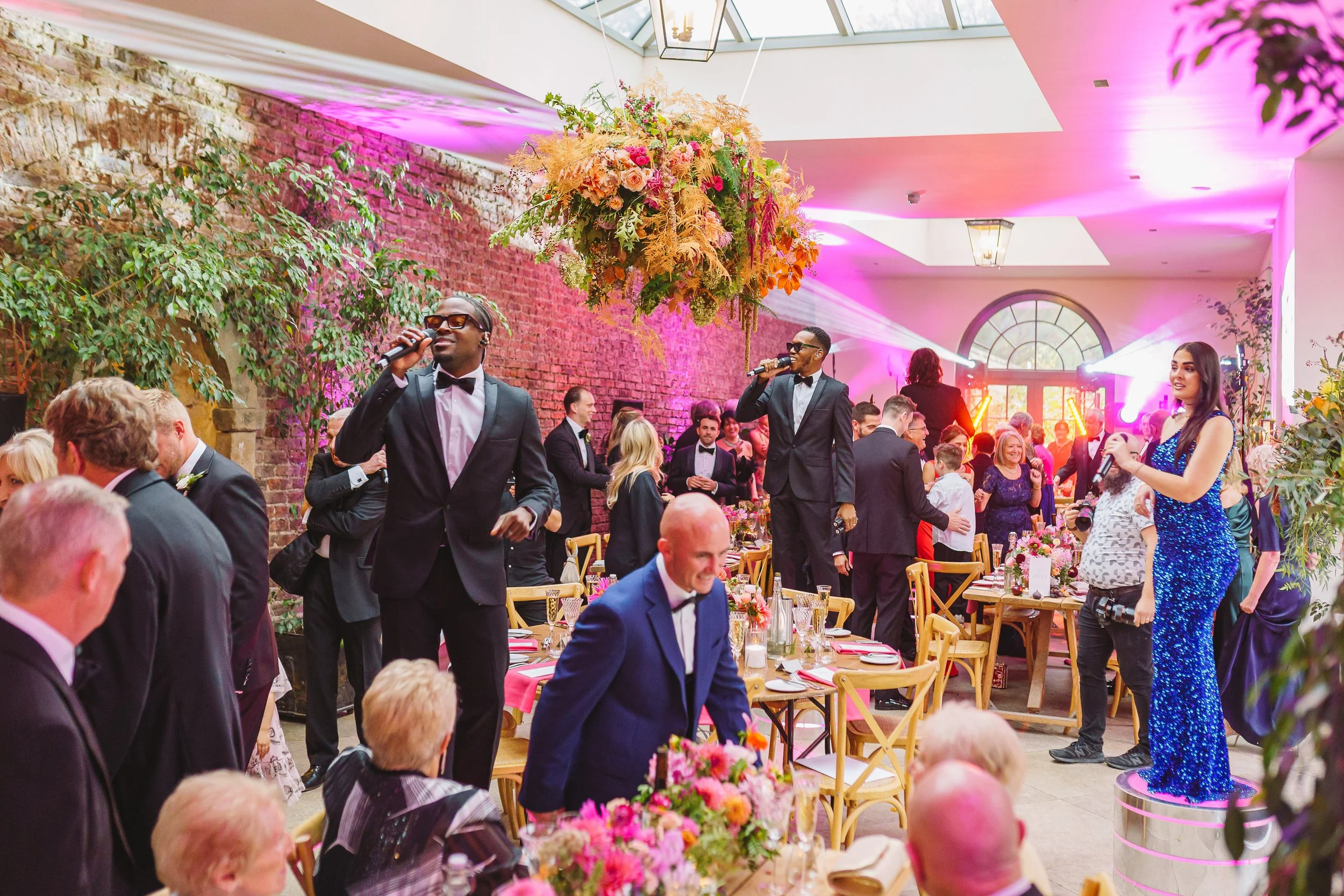 Party time at Middleton Lodge Fig House, a trio of singers serenading party guests