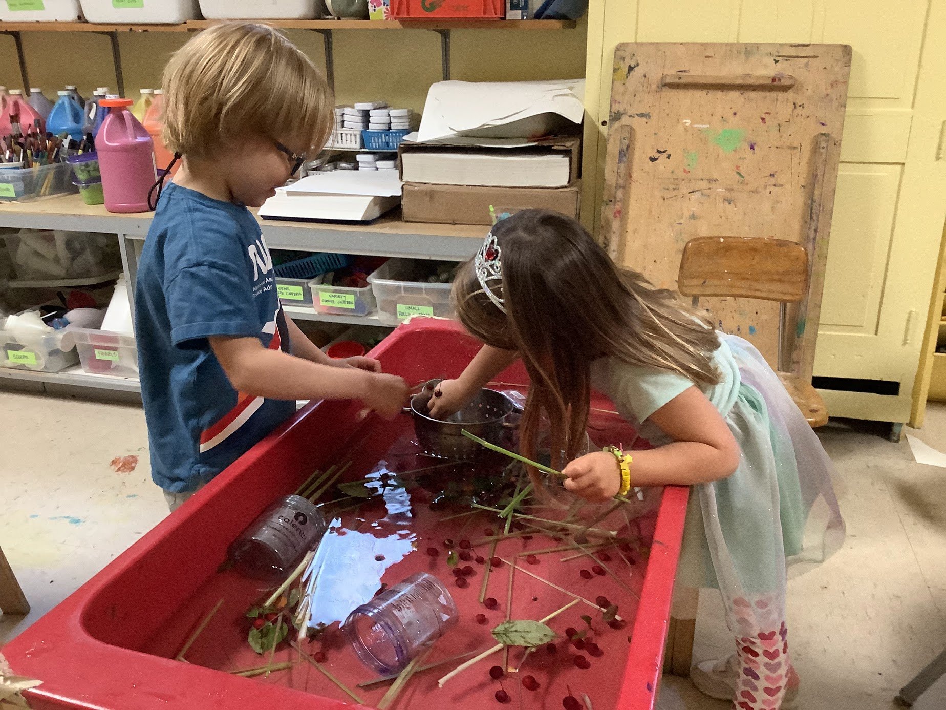 Playing in one of our sensory tables