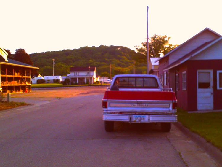 Red pickup truck on a side street. Bellevue, IA is chock-full of small-town charm